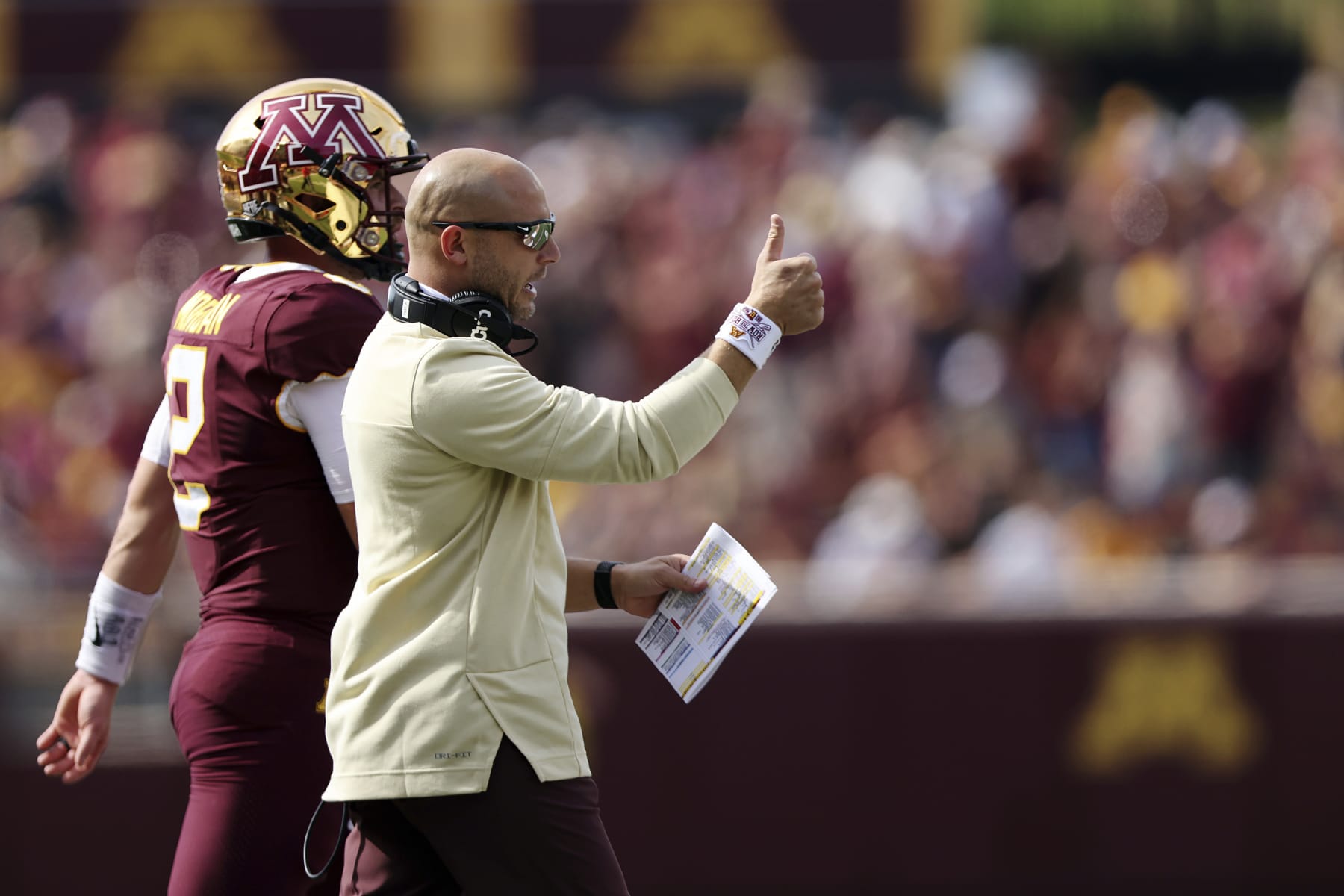 Minnesota head coach P.J. Fleck reacts after a play during the first half of an NCAA college football game against Colorado, Saturday, Sept. 17, 2022, in Minneapolis. (AP Photo/Stacy Bengs) Minnesota head coach P.J. Fleck reacts after a play during the first half of an NCAA college football game against Colorado, Saturday, Sept. 17, 2022, in Minneapolis. (AP Photo/Stacy Bengs)
