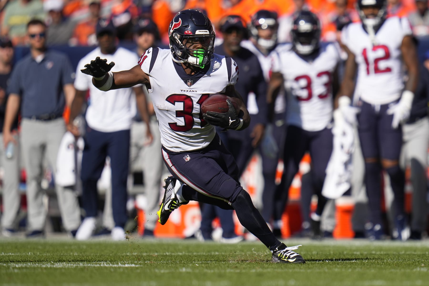 Houston Texans running back Dameon Pierce (31) runs against the Denver Broncos during the second half of an NFL football game, Sunday, Sept. 18, 2022, in Denver. (AP Photo/Jack Dempsey)
