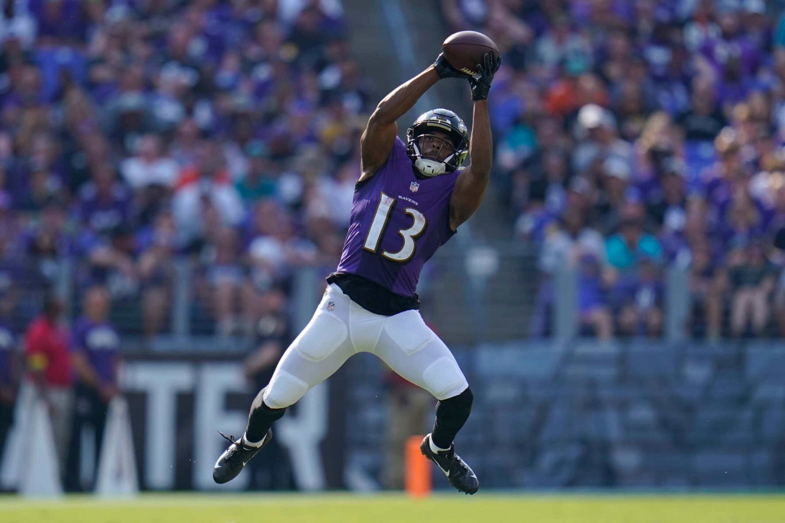 Baltimore Ravens wide receiver Devin Duvernay (13) grabs a pass during the second half of an NFL football game against the Miami Dolphins, Sunday, Sept. 18, 2022, in Baltimore. (AP Photo/Julio Cortez)