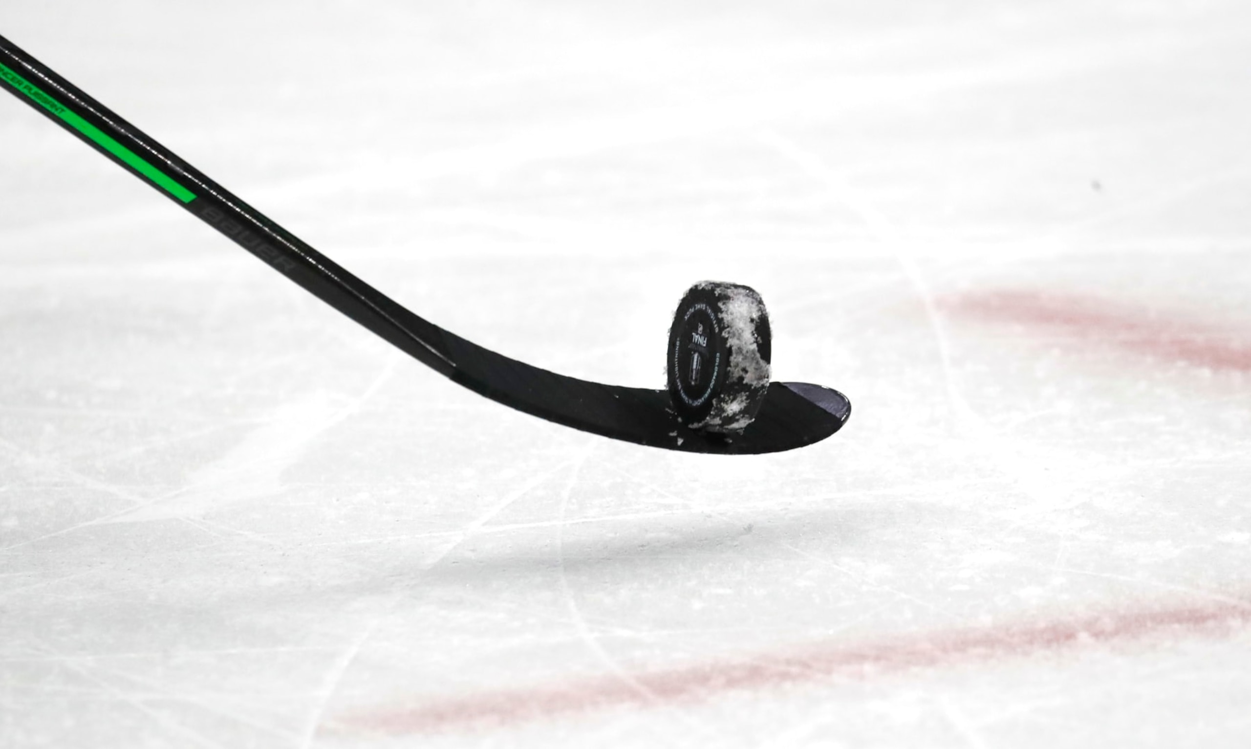 DENVER, COLORADO - JUNE 24: A general view of a stick and puck is seen during the second period of Game Five of the 2022 Stanley Cup Final between the Tampa Bay Lightning and the Colorado Avalanche at Ball Arena on June 24, 2022 in Denver.  (Photo by Eliot J. Schechter/NHLI via Getty Images)