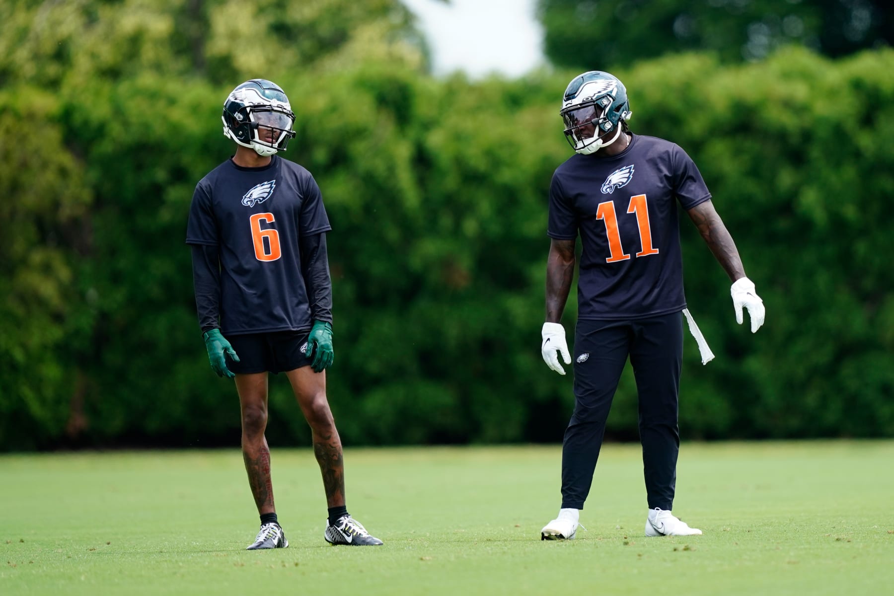 Philadelphia Eagles' DeVonta Smith, left, and A.J. Brown meet at the NFL football team's practice facility in Philadelphia, Friday, June 3, 2022. (AP Photo/Matt Rourke)
