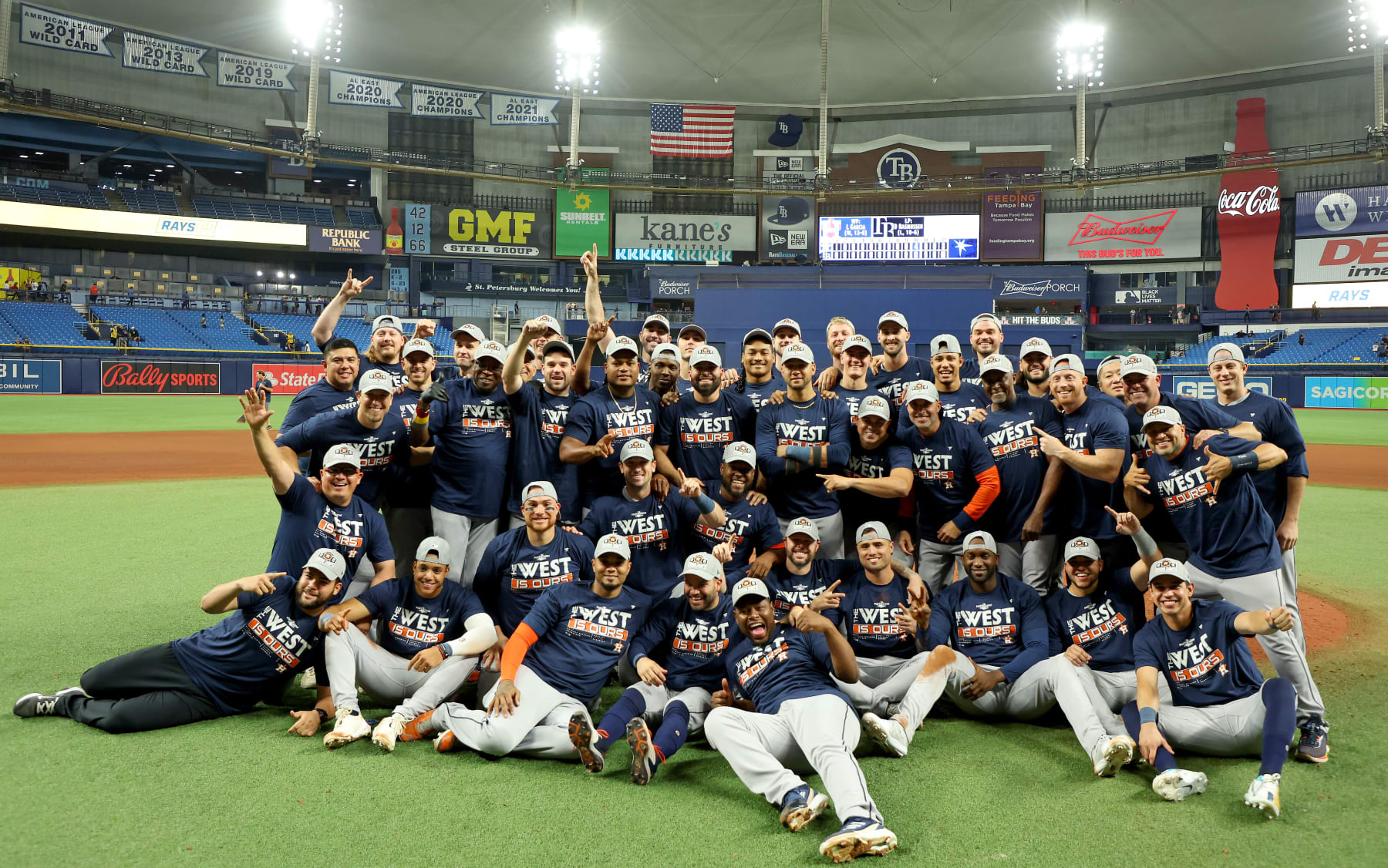 ST PETERSBURG, FLORIDA - SEPTEMBER 19: The Houston Astros celebrates winning the American League West Division following a game against the Tampa Bay Rays at Tropicana Field on September 19, 2022 in St Petersburg, Florida. (Photo by Mike Ehrmann/Getty Images)