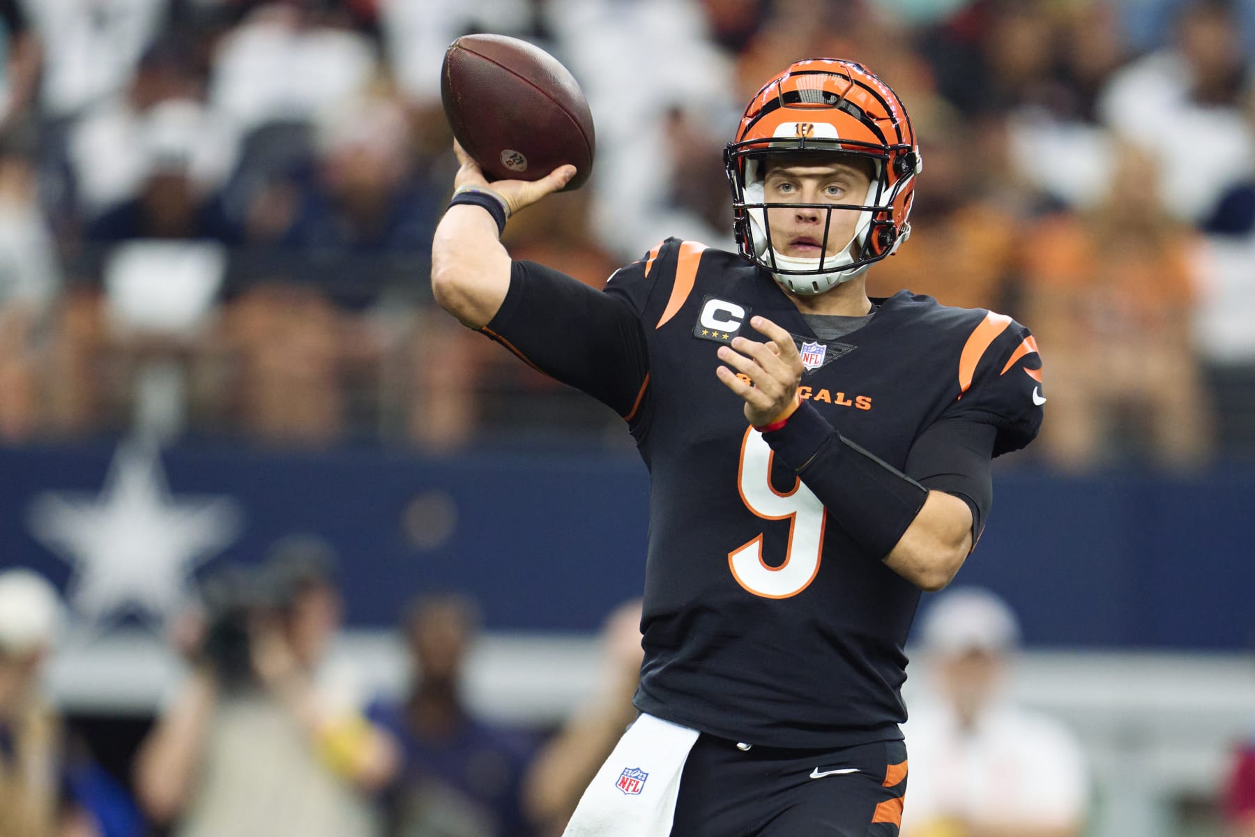 ARLINGTON, TX - SEPTEMBER 18: Joe Burrow #9 of the Cincinnati Bengals drops back to pass against the Dallas Cowboys at AT&T Stadium on September 18, 2022 in Arlington, Texas. (Photo by Cooper Neill/Getty Images)