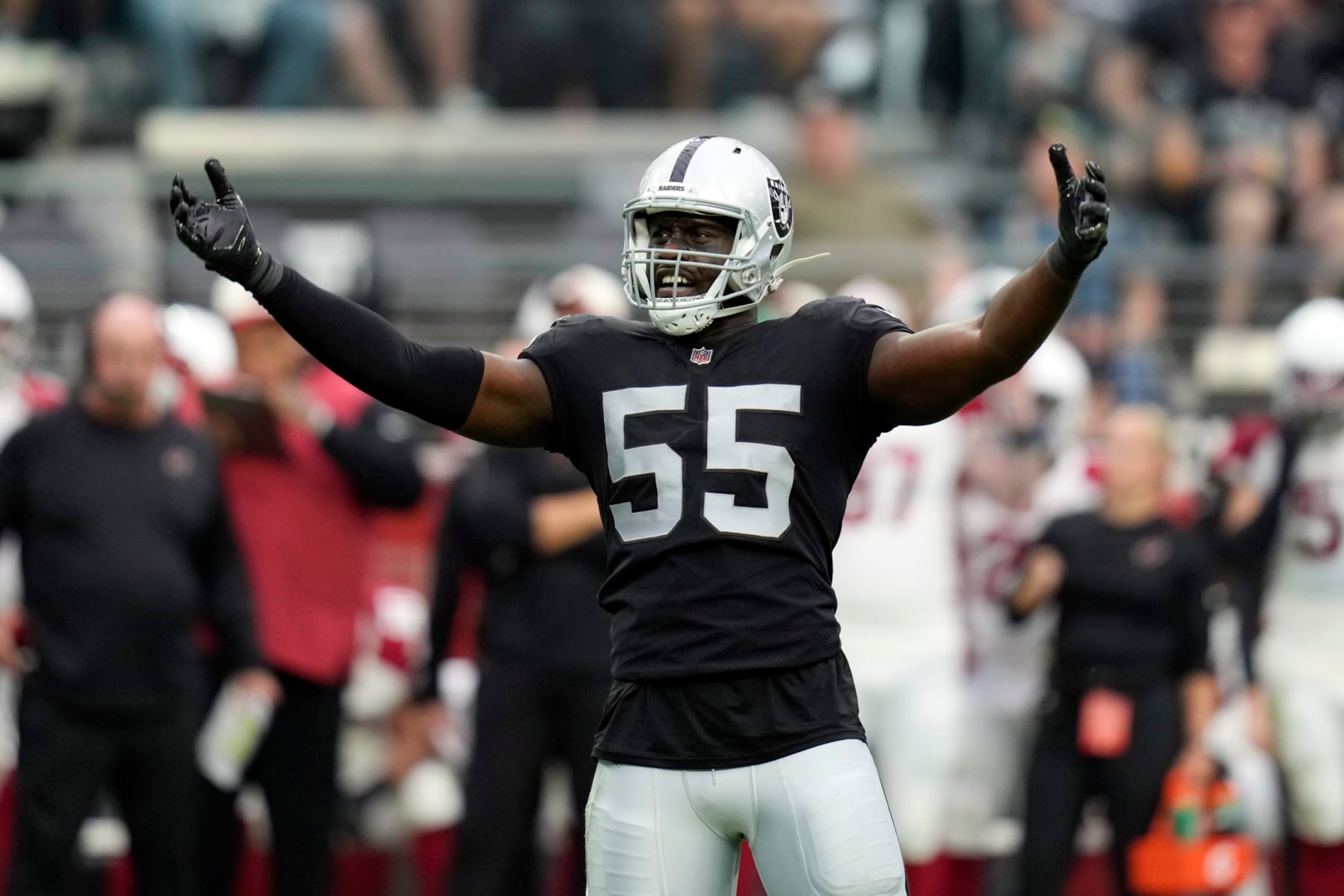 Las Vegas Raiders defensive end Chandler Jones (55) celebrates during the first half of an NFL football game against the Arizona Cardinals Sunday, Sept. 18, 2022, in Las Vegas. (AP Photo/John Locher) Las Vegas Raiders defensive end Chandler Jones (55) celebrates during the first half of an NFL football game against the Arizona Cardinals Sunday, Sept. 18, 2022, in Las Vegas. (AP Photo/John Locher)