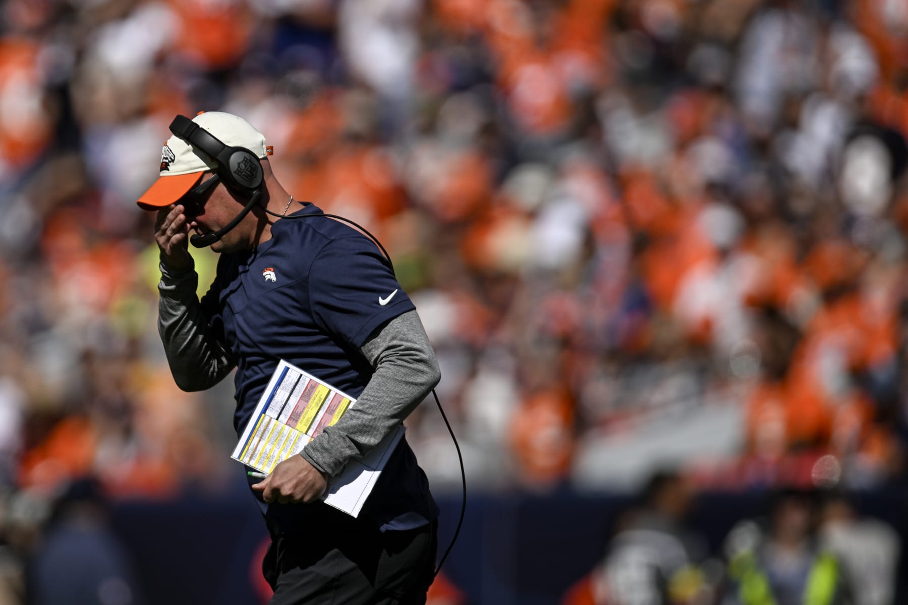 DENVER, CO - SEPTEMBER 18: Head coach Nathaniel Hackett of the Denver Broncos jogs off the field during the first quarter against the Houston Texans at Empower Field at Mile High in Denver on Sunday, September 18, 2022. (Photo by AAron Ontiveroz/MediaNews Group/The Denver Post via Getty Images) DENVER, CO - SEPTEMBER 18: Head coach Nathaniel Hackett of the Denver Broncos jogs off the field during the first quarter against the Houston Texans at Empower Field at Mile High in Denver on Sunday, September 18, 2022. (Photo by AAron Ontiveroz/MediaNews Group/The Denver Post via Getty Images)