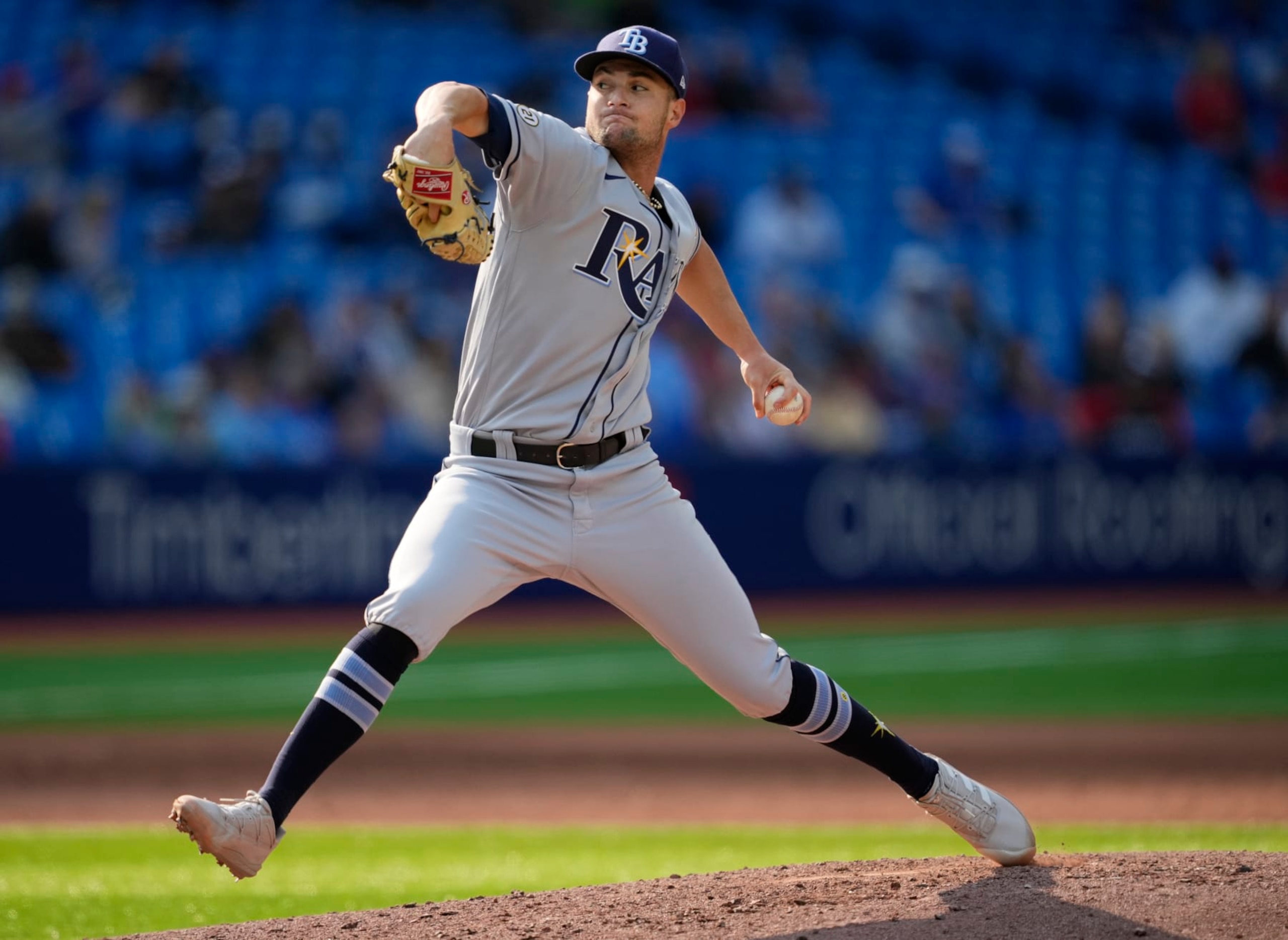 TORONTO, ON - SEPTEMBER 15: Shane McClanahan #18 of the Tampa Bay Rays pitches to the Toronto Blue Jays in the fifth inning during their MLB game at the Rogers Centre on September 15, 2022 in Toronto, Ontario, Canada. (Photo by Mark Blinch/Getty Images)