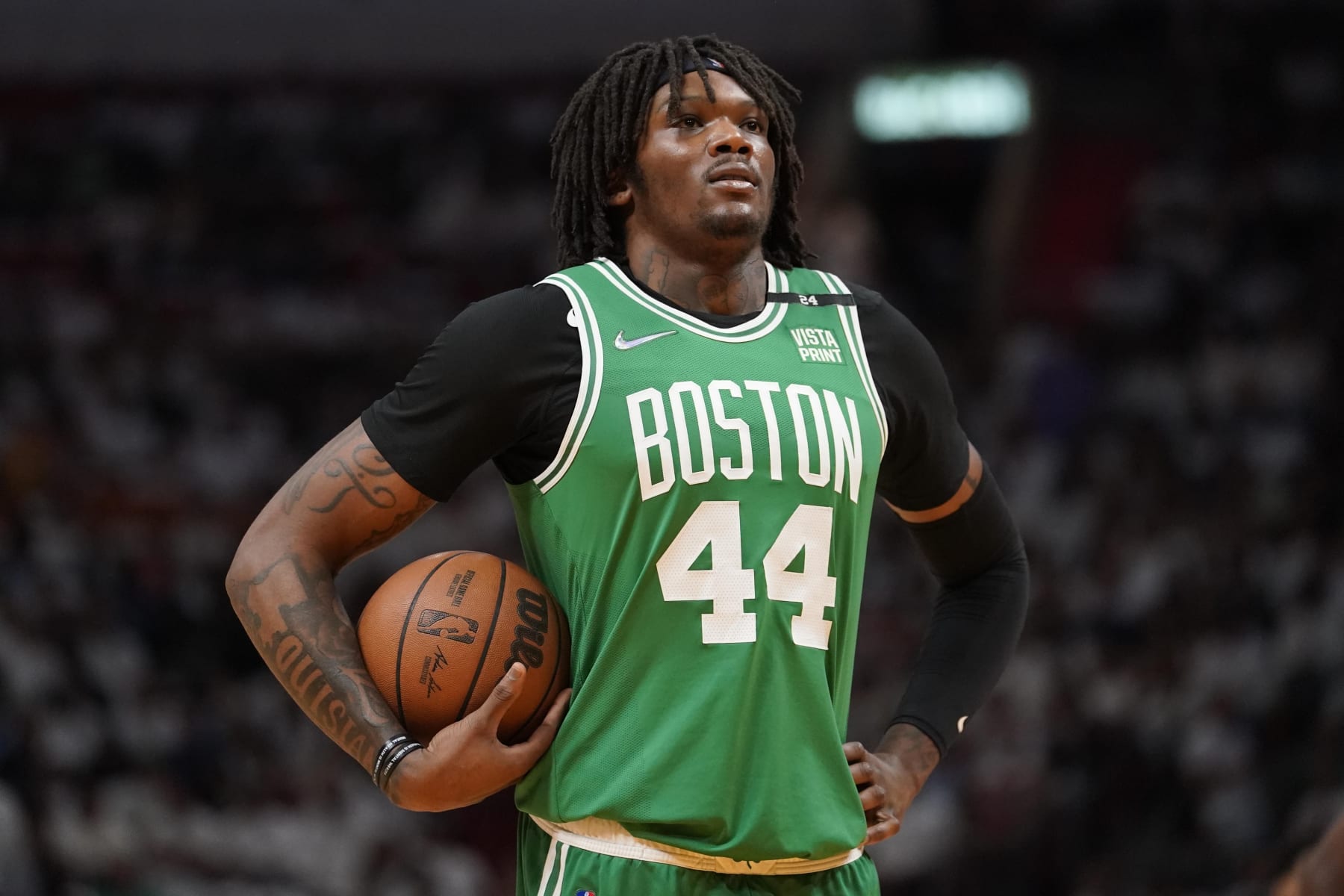 Boston Celtics center Robert Williams III (44) waits for play to resume during the first half of Game 1 of an NBA basketball Eastern Conference finals playoff series against the Miami Heat, Tuesday, May 17, 2022, in Miami. (AP Photo/Lynne Sladky)