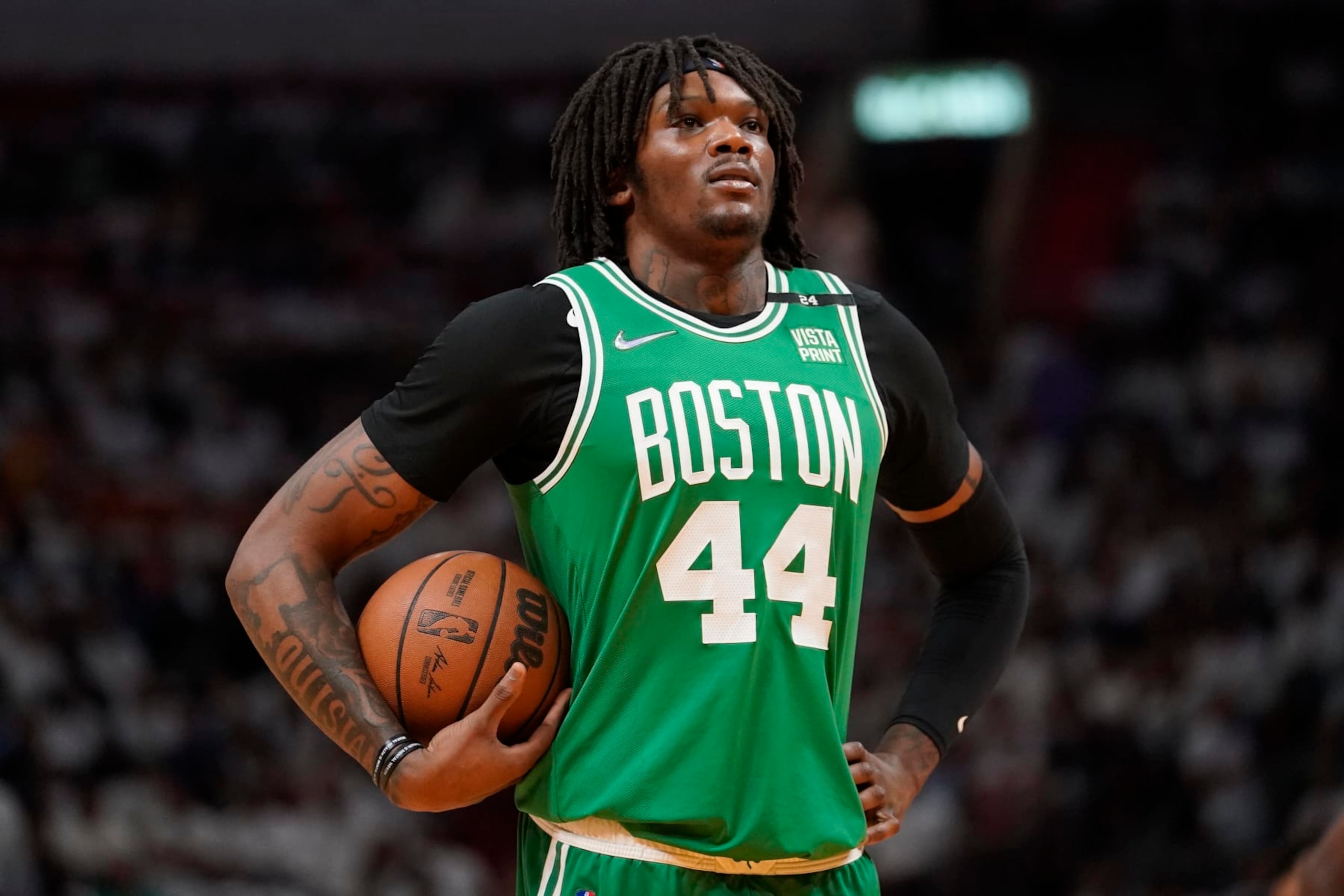Boston Celtics center Robert Williams III (44) waits for play to resume during the first half of Game 1 of an NBA basketball Eastern Conference finals playoff series against the Miami Heat, Tuesday, May 17, 2022, in Miami. (AP Photo/Lynne Sladky)