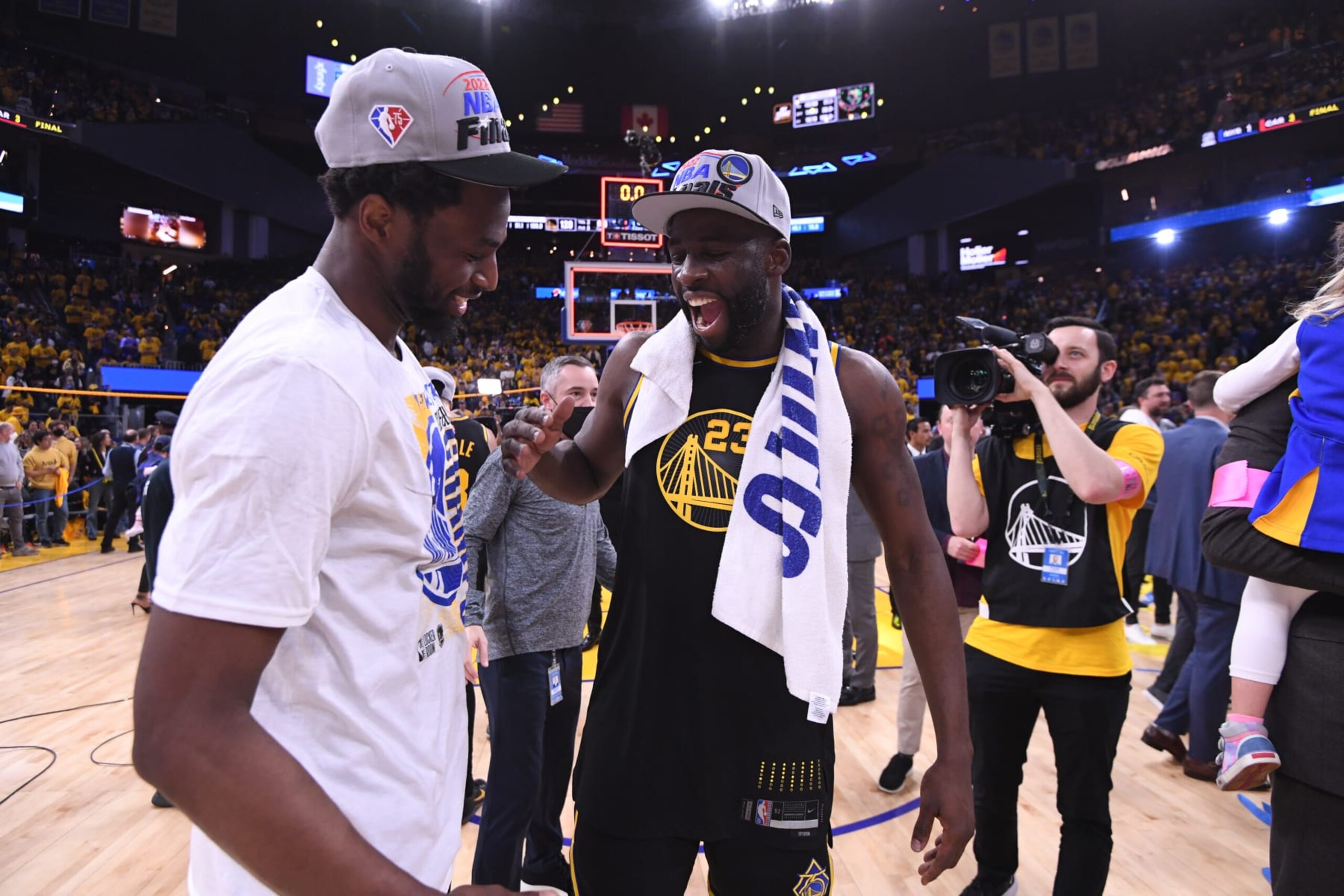 SAN FRANCISCO, CA - MAY 26: Andrew Wiggins #22 and Draymond Green #23 of the Golden State Warriors celebrate after Game 5 of the 2022 NBA Playoffs Western Conference Finals on March 26, 2022 at Chase Center in San Francisco, California. NOTE TO USER: User expressly acknowledges and agrees that, by downloading and or using this photograph, user is consenting to the terms and conditions of Getty Images License Agreement. Mandatory Copyright Notice: Copyright 2022 NBAE (Photo by Noah Graham/NBAE via Getty Images)