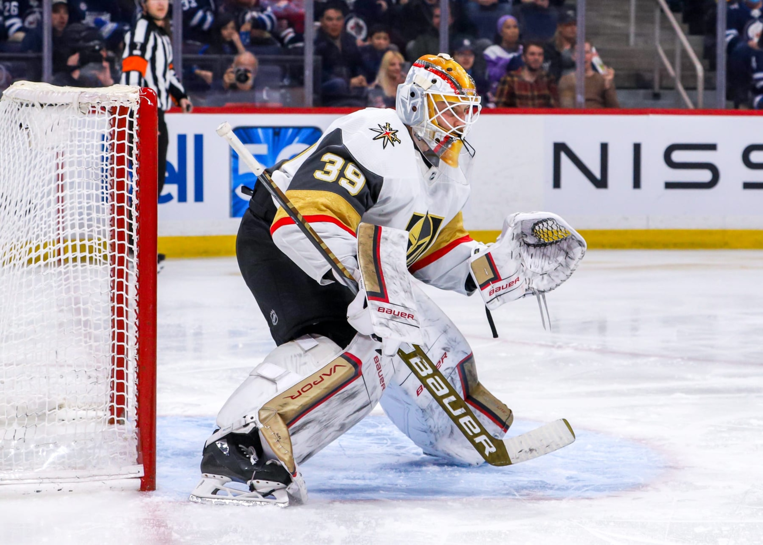 WINNIPEG, MB - MARCH 15: Goaltender Laurent Brossoit #39 of the Vegas Golden Knights guards the net during second period action against the Winnipeg Jets at Canada Life Centre on March 15, 2022 in Winnipeg, Manitoba, Canada. (Photo by Darcy Finley/NHLI via Getty Images)