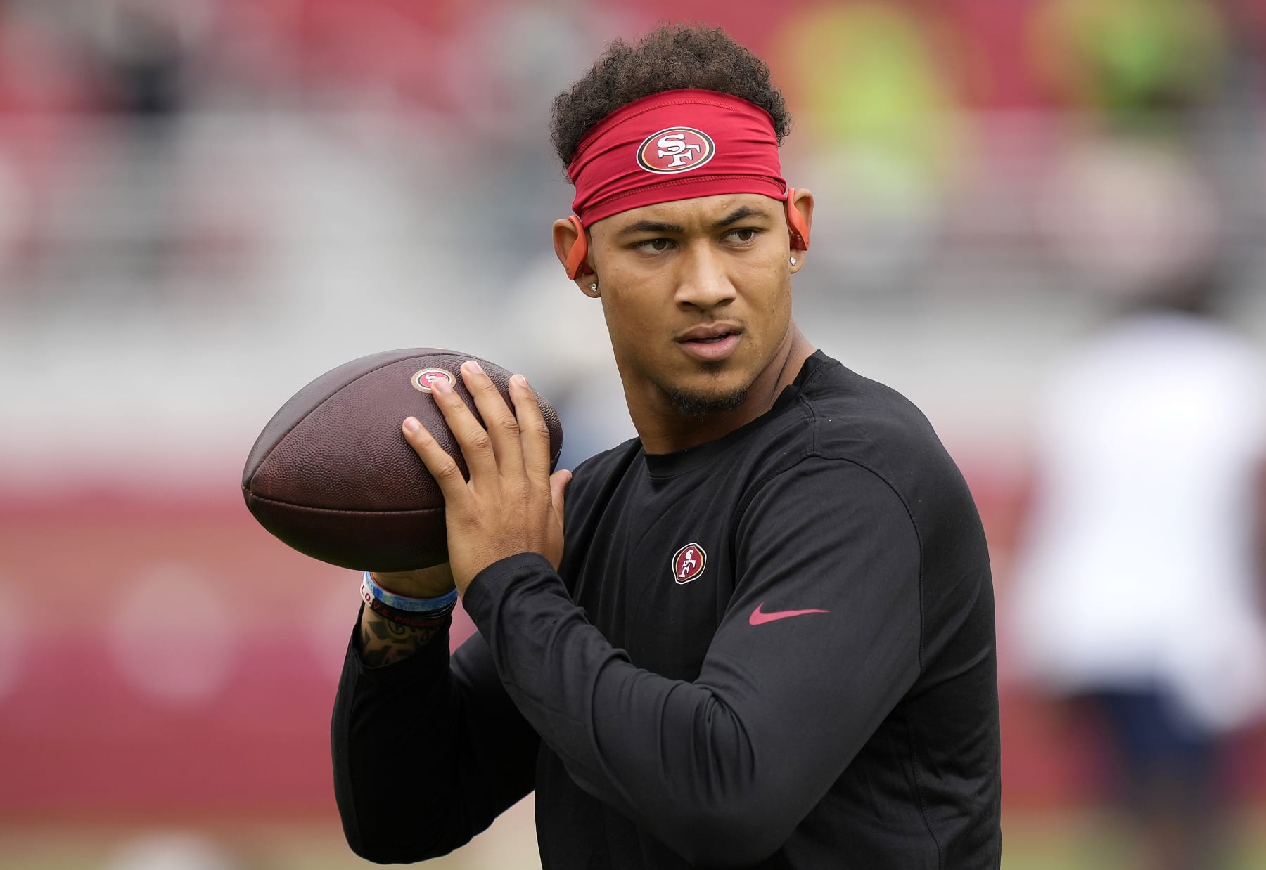 SANTA CLARA, CALIFORNIA - SEPTEMBER 18: Trey Lance #5 of the San Francisco 49ers warms up before the game against the Seattle Seahawks at Levi's Stadium on September 18, 2022 in Santa Clara, California. (Photo by Thearon W. Henderson/Getty Images)