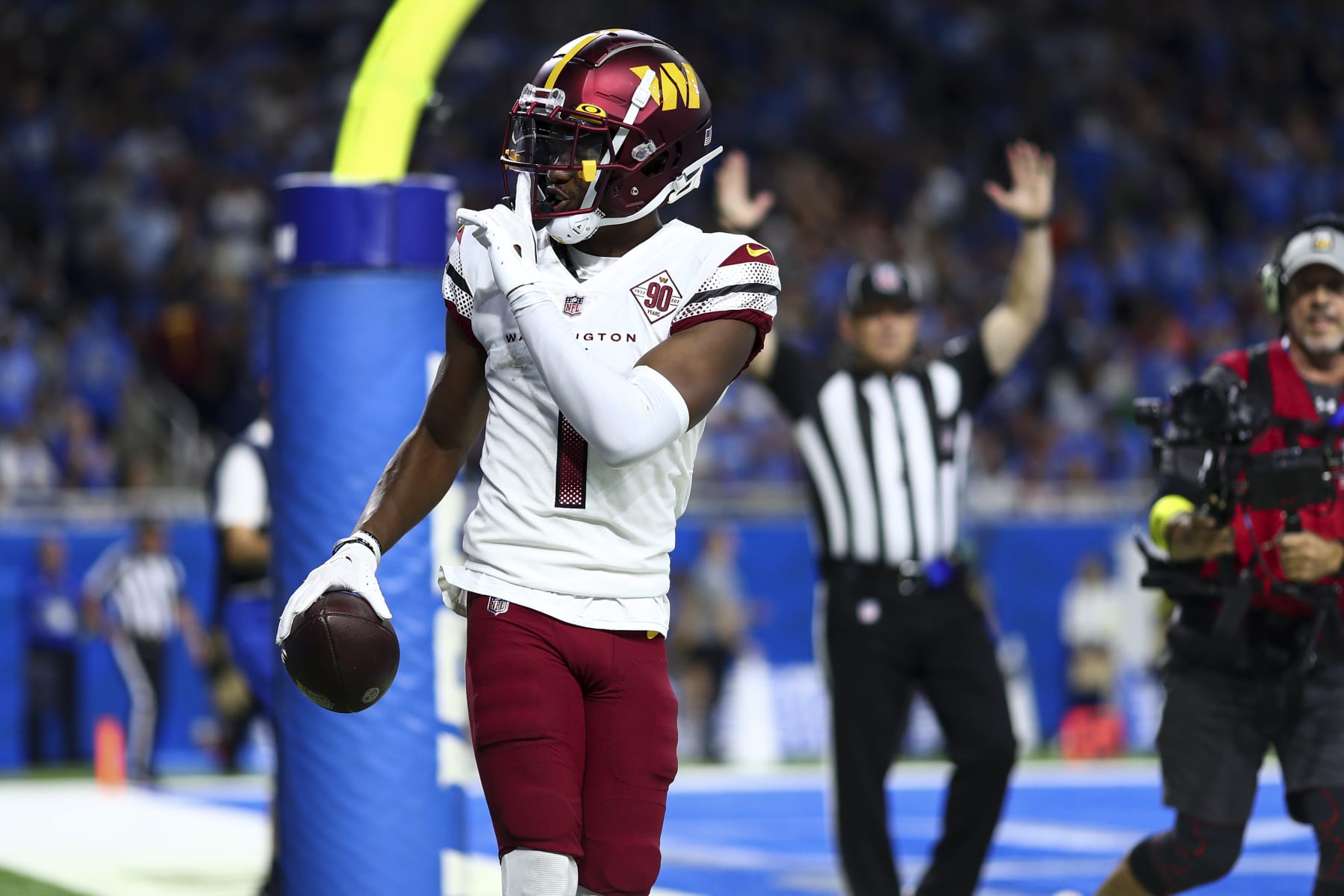 DETROIT, MI - SEPTEMBER 18: Jahan Dotson #1 of the Washington Commanders celebrates after scoring a two-point conversion during an NFL football game against the Detroit Lions at Ford Field on September 18, 2022 in Detroit, Michigan. (Photo by Kevin Sabitus/Getty Images)