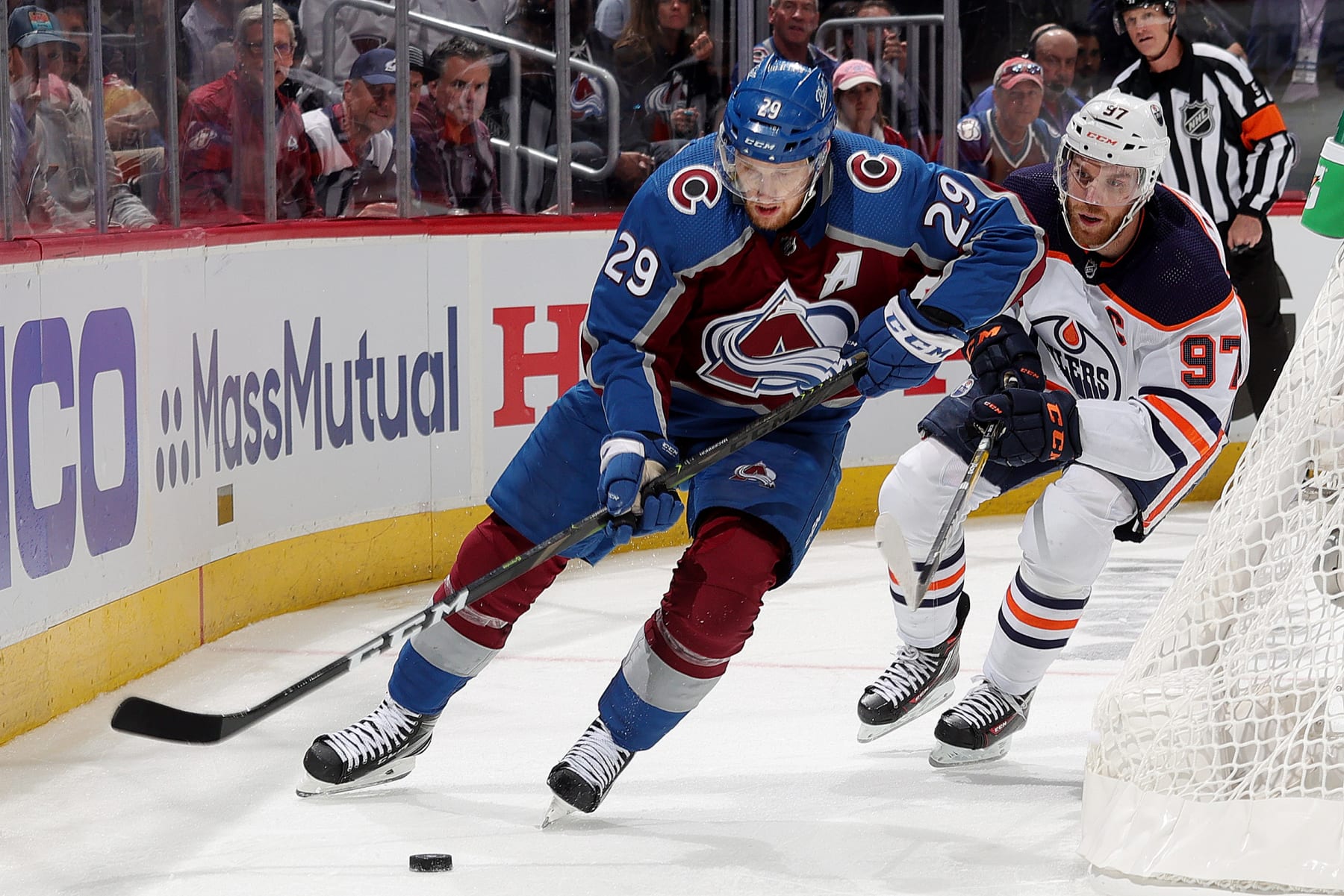 DENVER, COLORADO - JUNE 02: Nathan MacKinnon #29 of the Colorado Avalanche skates against Connor McDavid #97 of the Edmonton Oilers in Game Two of the Western Conference Final of the 2022 Stanley Cup Playoffs at Ball Arena on June 02, 2022 in Denver, Colorado. (Photo by Michael Martin/NHLI via Getty Images)