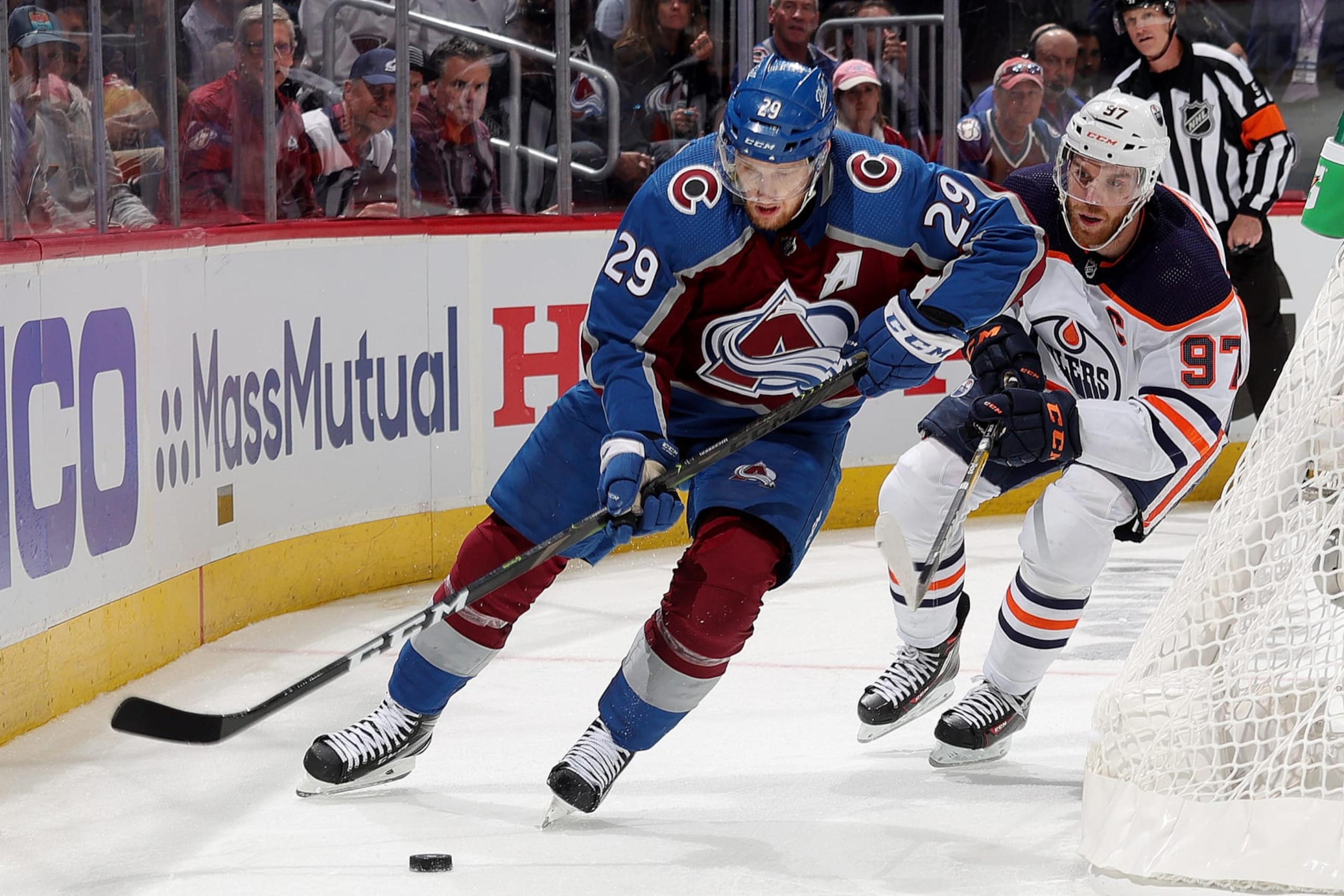 DENVER, COLORADO - JUNE 02: Nathan MacKinnon #29 of the Colorado Avalanche skates against Connor McDavid #97 of the Edmonton Oilers in Game Two of the Western Conference Final of the 2022 Stanley Cup Playoffs at Ball Arena on June 02, 2022 in Denver, Colorado. (Photo by Michael Martin/NHLI via Getty Images)