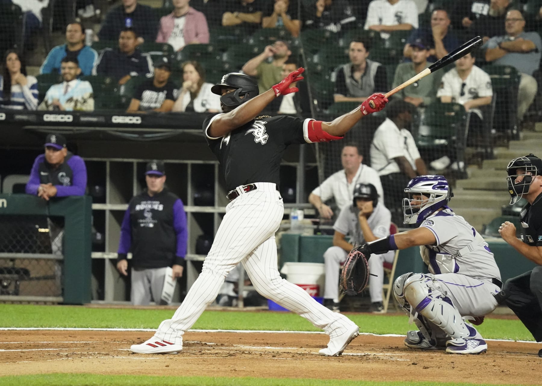 CHICAGO, ILLINOIS - SEPTEMBER 13: Eloy Jimenez #74 of the Chicago White Sox hits a three-run home run during the first inning of a game against the Colorado Rockies at Guaranteed Rate Field on September 13, 2022 in Chicago, Illinois. (Photo by Nuccio DiNuzzo/Getty Images)