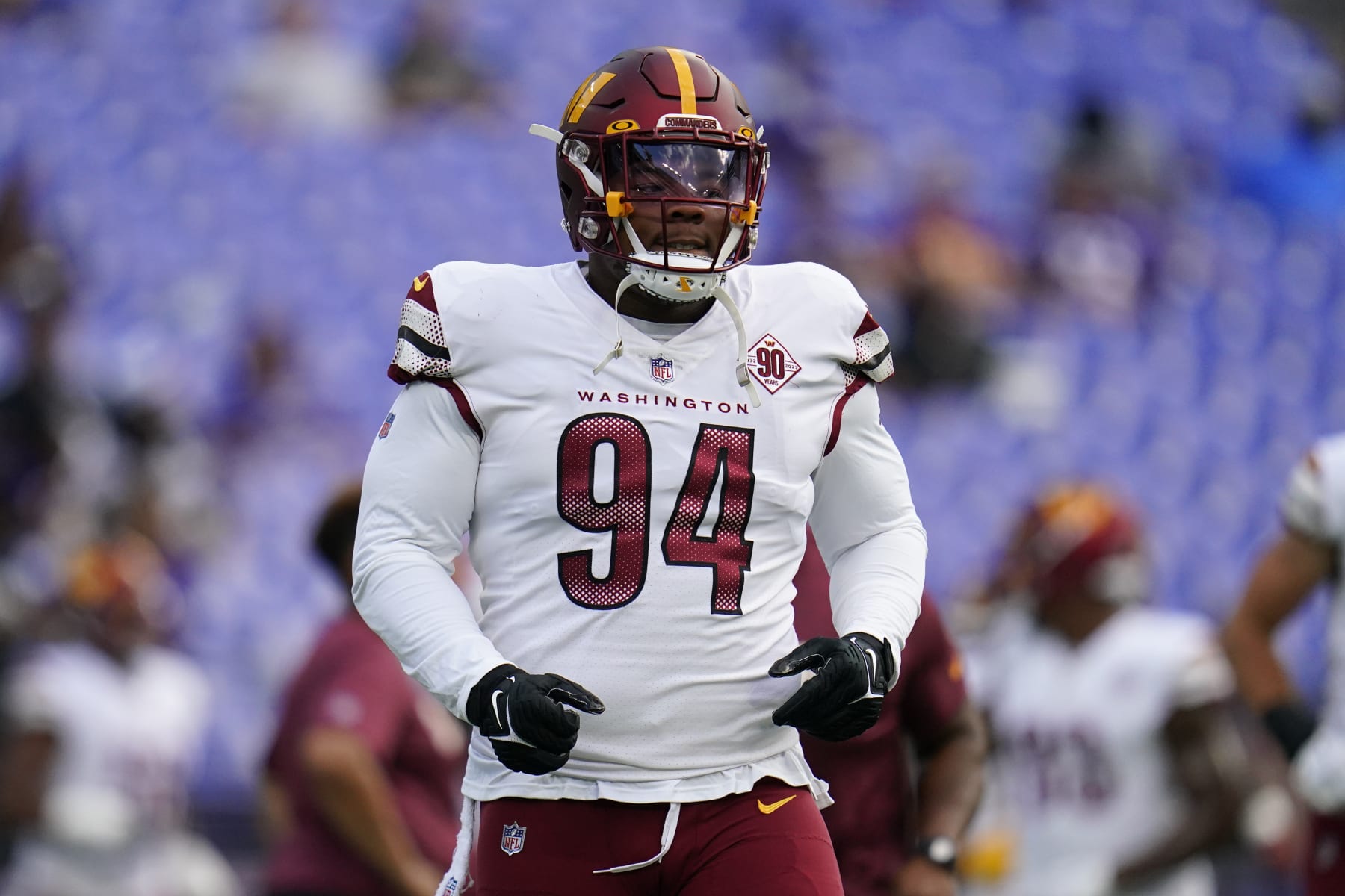 Washington Commanders defensive tackle Daron Payne warms up before a preseason NFL football game against the Baltimore Ravens, Saturday, Aug. 27, 2022, in Baltimore. (AP Photo/Julio Cortez)