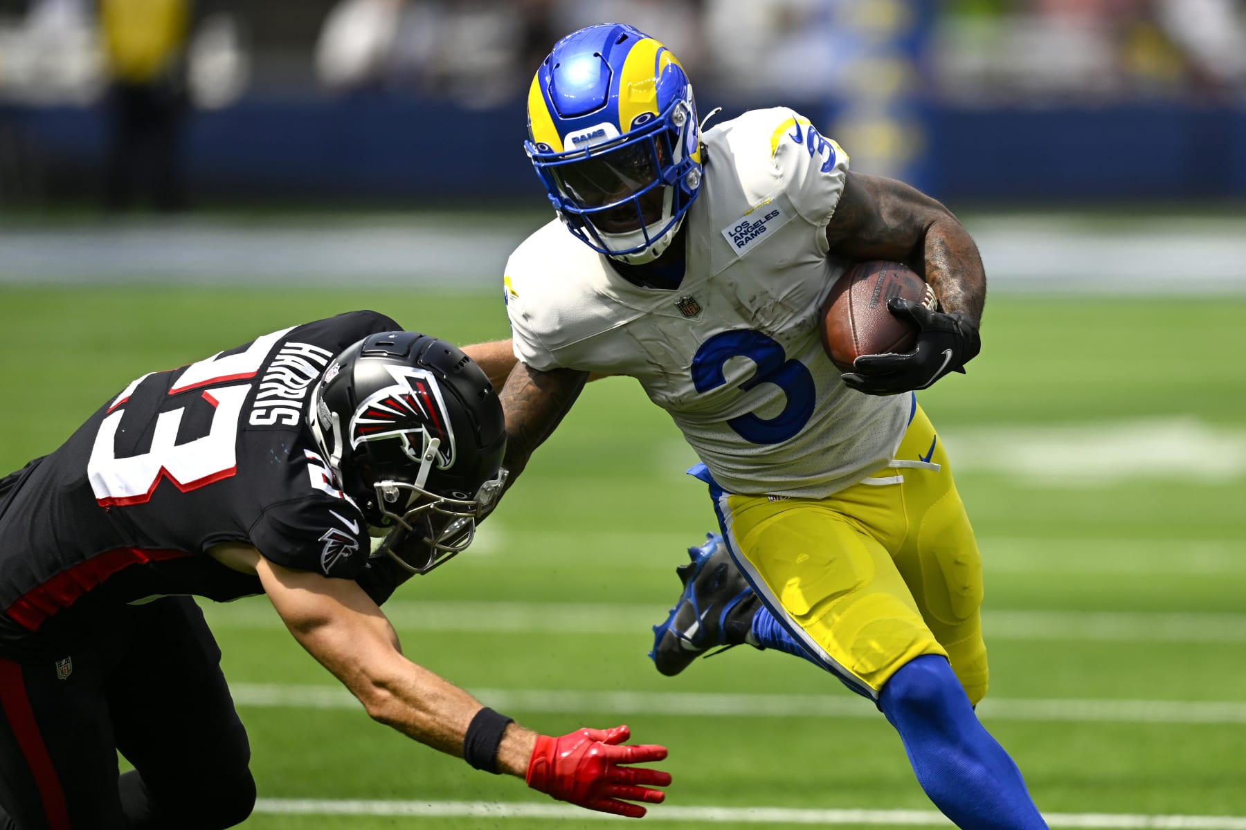 INGLEWOOD, CALIFORNIA - SEPTEMBER 18: Cam Akers #3 of the Los Angeles Rams carries the ball past Nick Kwiatkoski #53 of the Atlanta Falcons during the second quarter at SoFi Stadium on September 18, 2022 in Inglewood, California. (Photo by John McCoy/Getty Images)