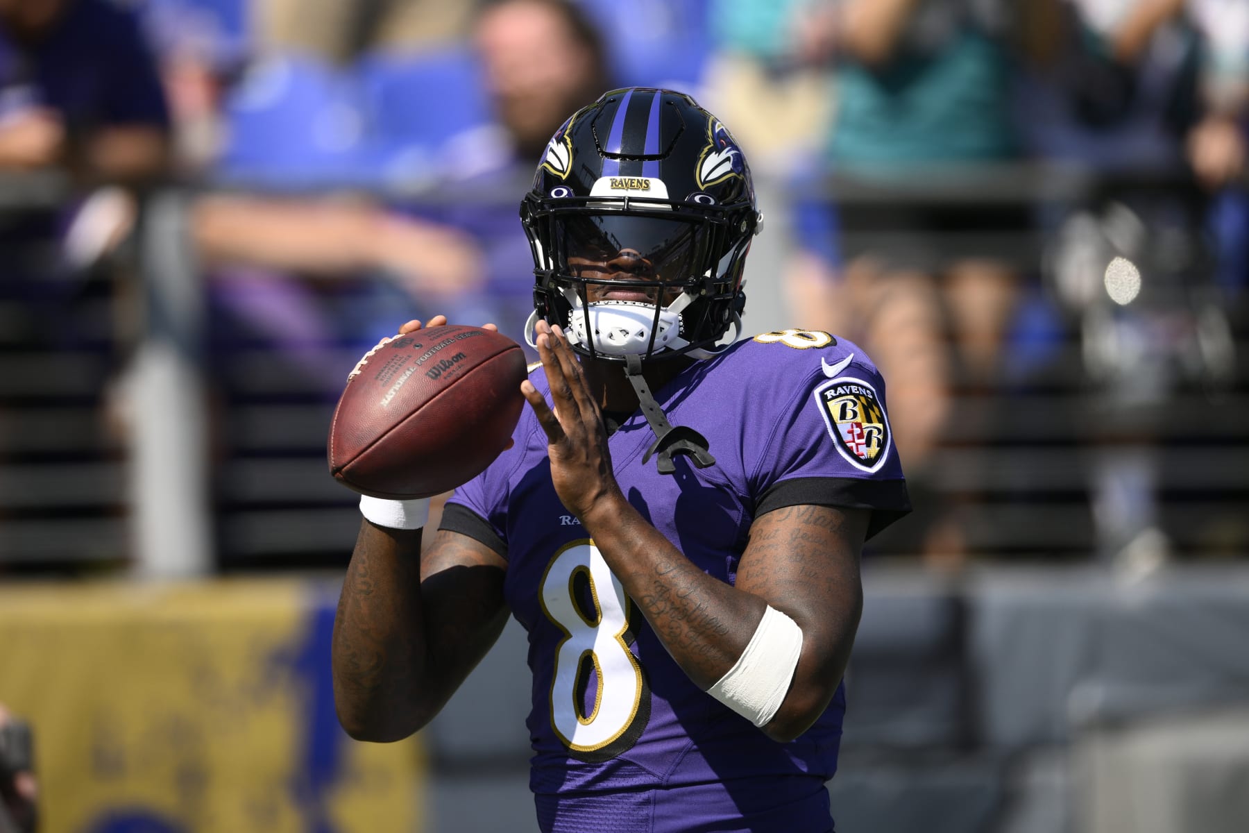 Baltimore Ravens quarterback Lamar Jackson (8) warms up prior to an NFL football game against the Miami Dolphins, Sunday, Sept. 18, 2022, in Baltimore. (AP Photo/Nick Wass)