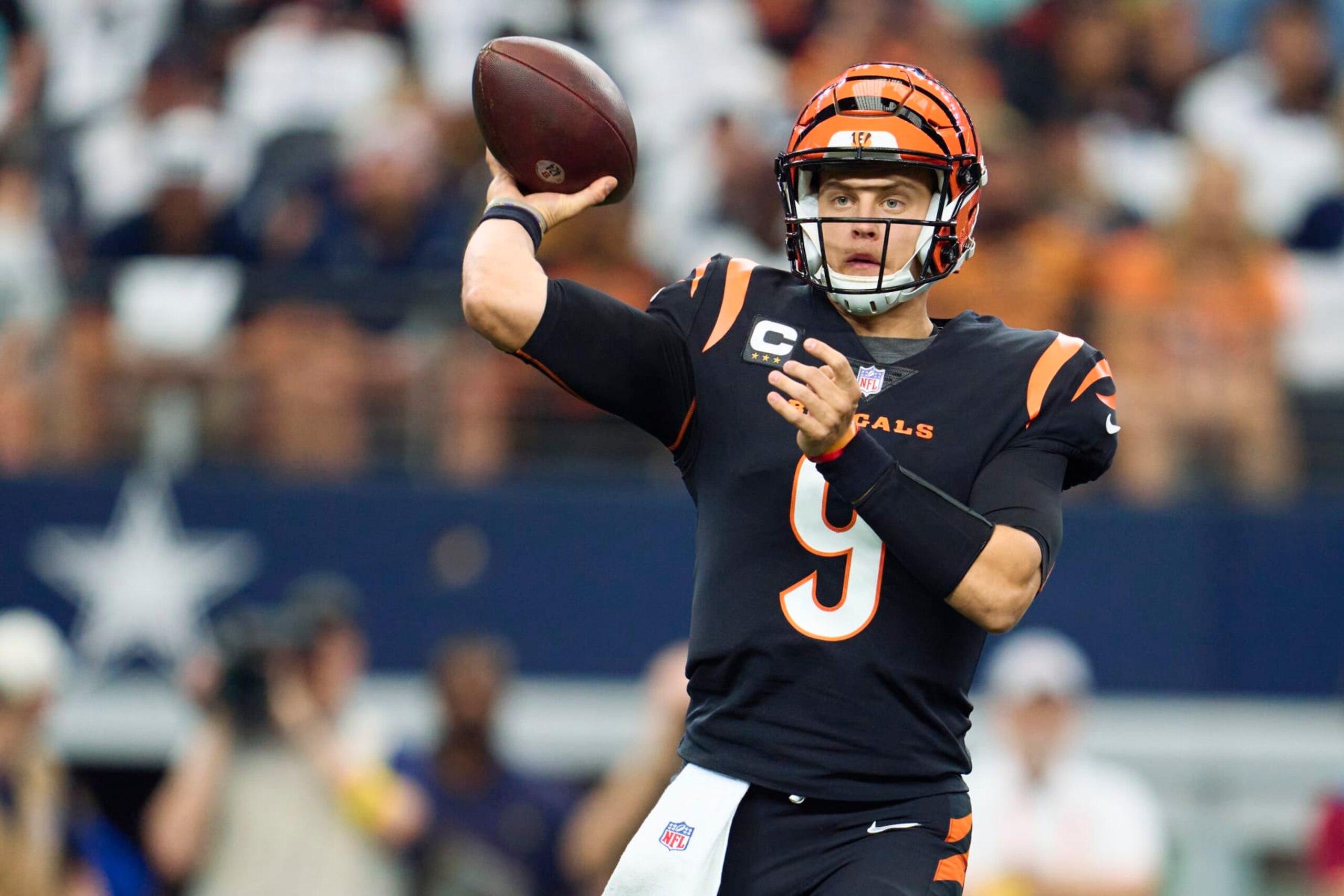ARLINGTON, TX - SEPTEMBER 18: Joe Burrow #9 of the Cincinnati Bengals drops back to pass against the Dallas Cowboys at AT&T Stadium on September 18, 2022 in Arlington, Texas. (Photo by Cooper Neill/Getty Images)