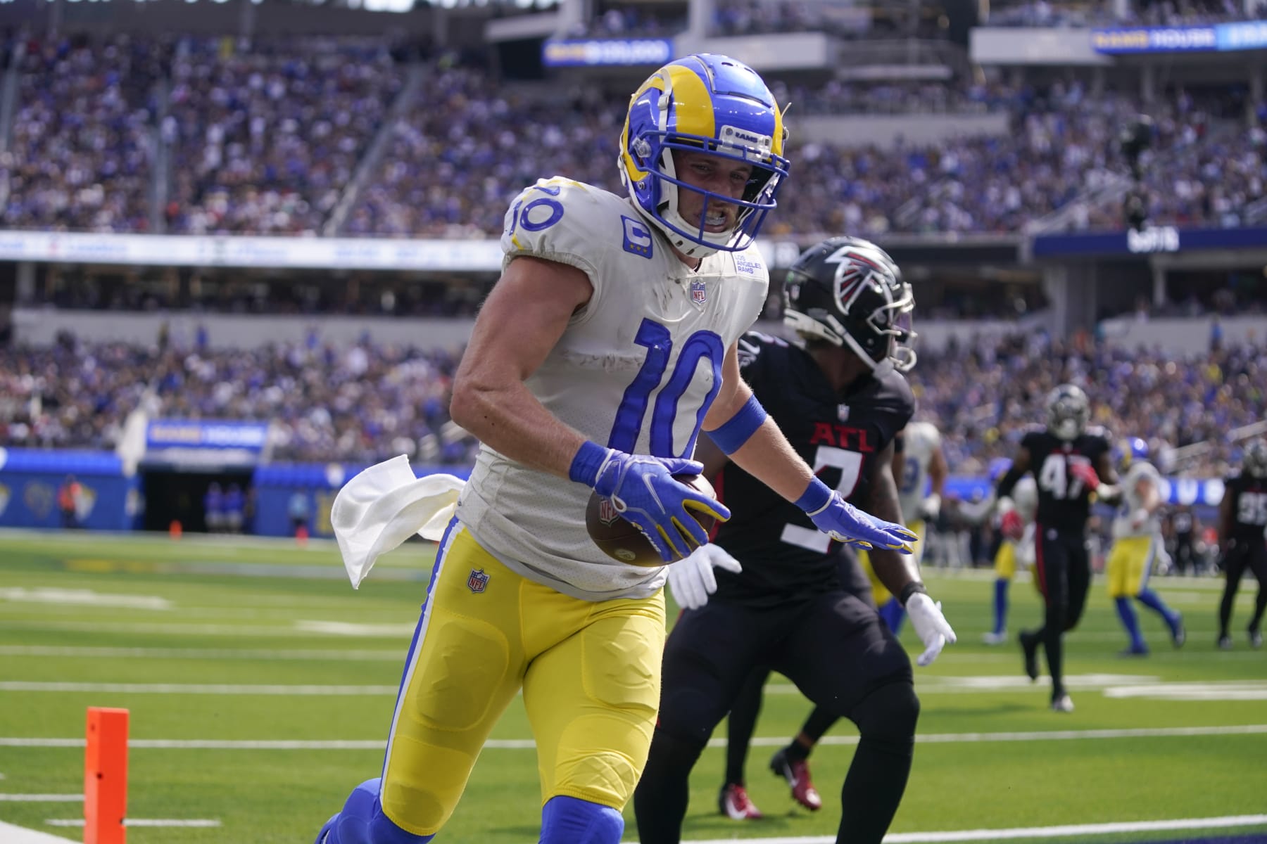 Los Angeles Rams wide receiver Cooper Kupp celebrates after scoring a touchdown during the second half of an NFL football game against the Atlanta Falcons, Sunday, Sept. 18, 2022, in Inglewood, Calif. (AP Photo/Mark J. Terrill)