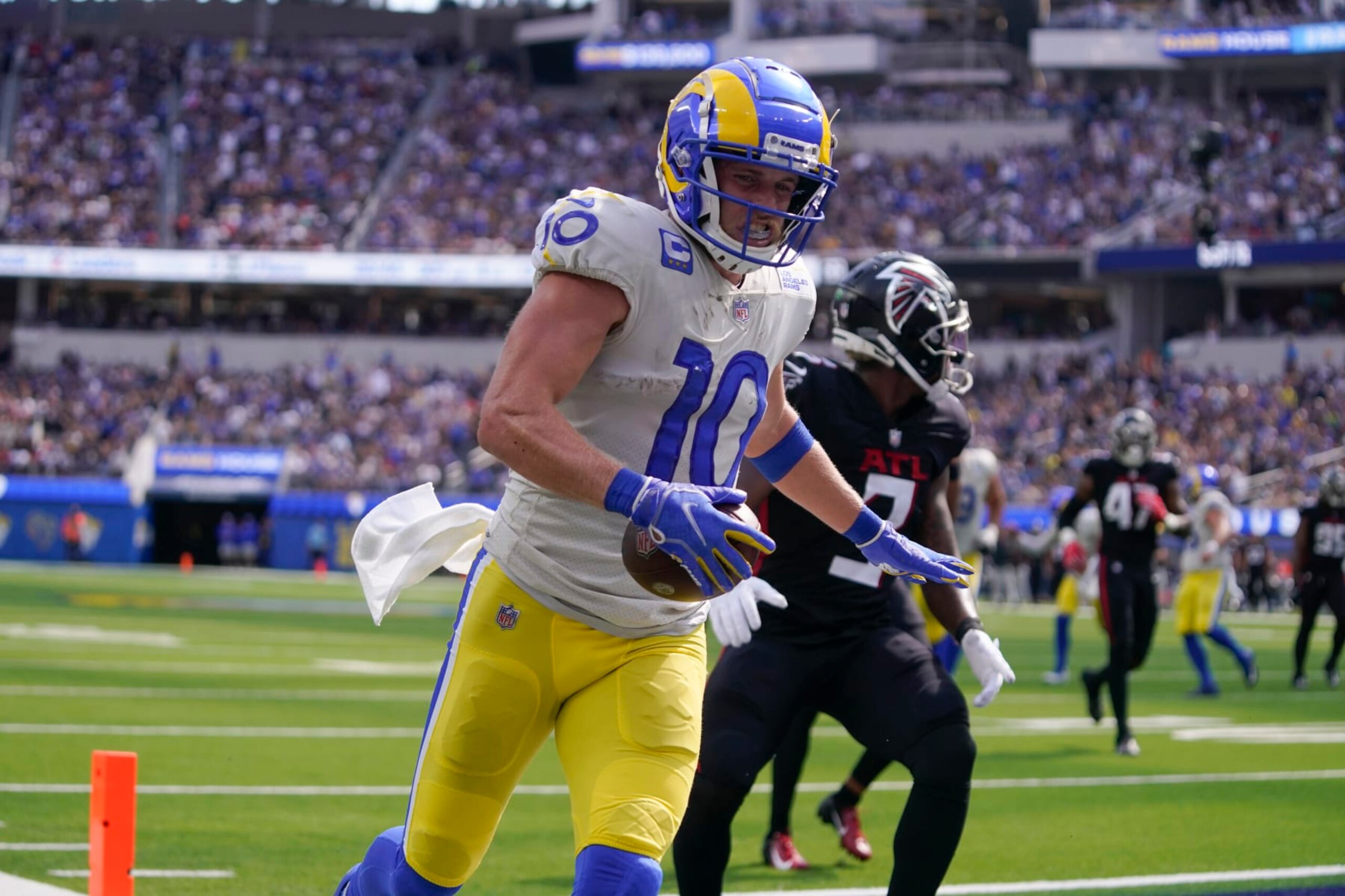Los Angeles Rams wide receiver Cooper Kupp celebrates after scoring a touchdown during the second half of an NFL football game against the Atlanta Falcons, Sunday, Sept. 18, 2022, in Inglewood, Calif. (AP Photo/Mark J. Terrill)