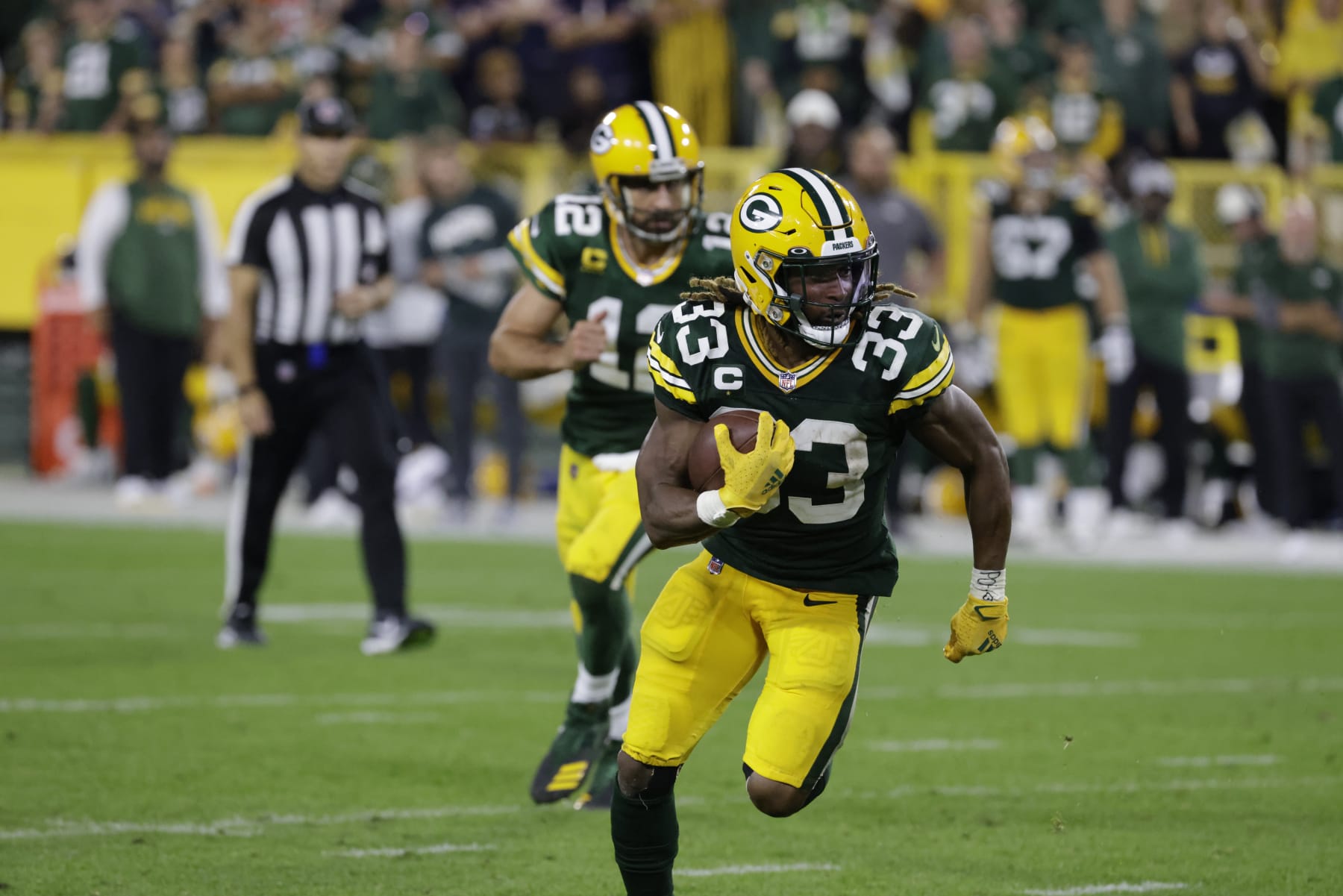 Green Bay Packers running back Aaron Jones (33) during an NFL football game between the Packers and Bears Sunday, Sept. 18, 2022, in Green Bay, Wis. (AP Photo/Mike Roemer)