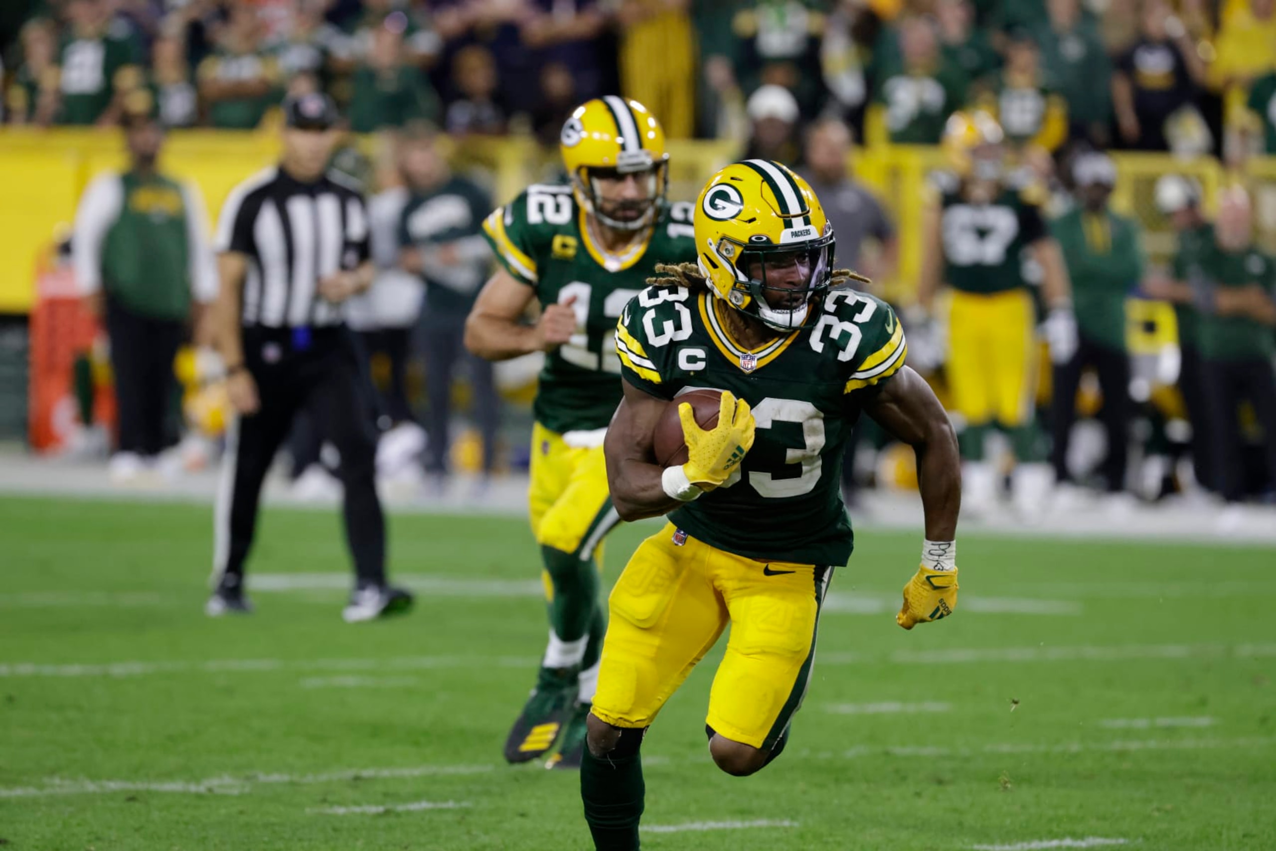 Green Bay Packers running back Aaron Jones (33) during an NFL football game between the Packers and Bears Sunday, Sept. 18, 2022, in Green Bay, Wis. (AP Photo/Mike Roemer)