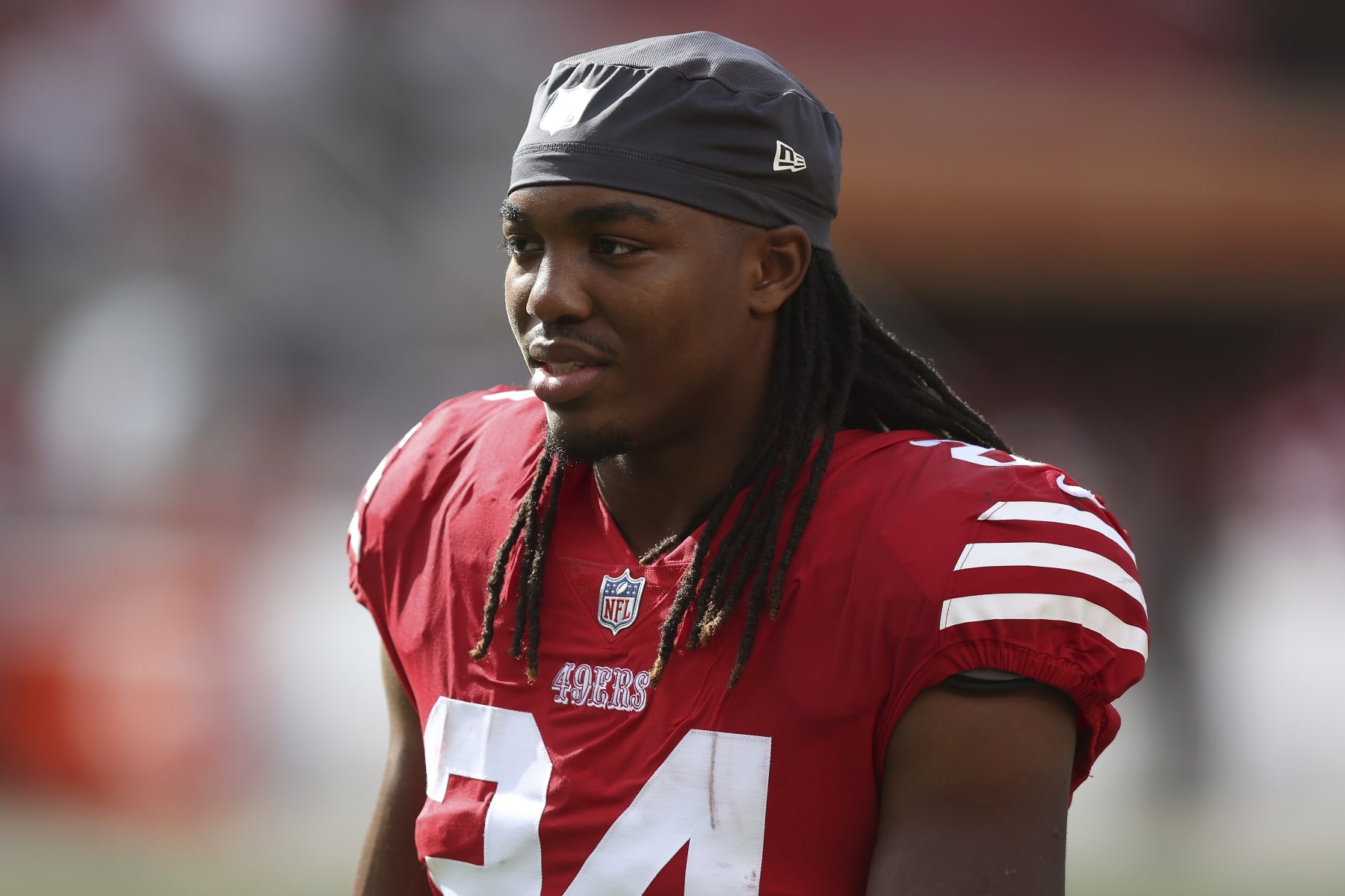 San Francisco 49ers running back Jordan Mason (24) looks on after a win during an NFL football game against the Seattle Seahawks, Sunday, Sept. 18, 2022 in Santa Clara, Calif. (AP Photo/Lachlan Cunningham)