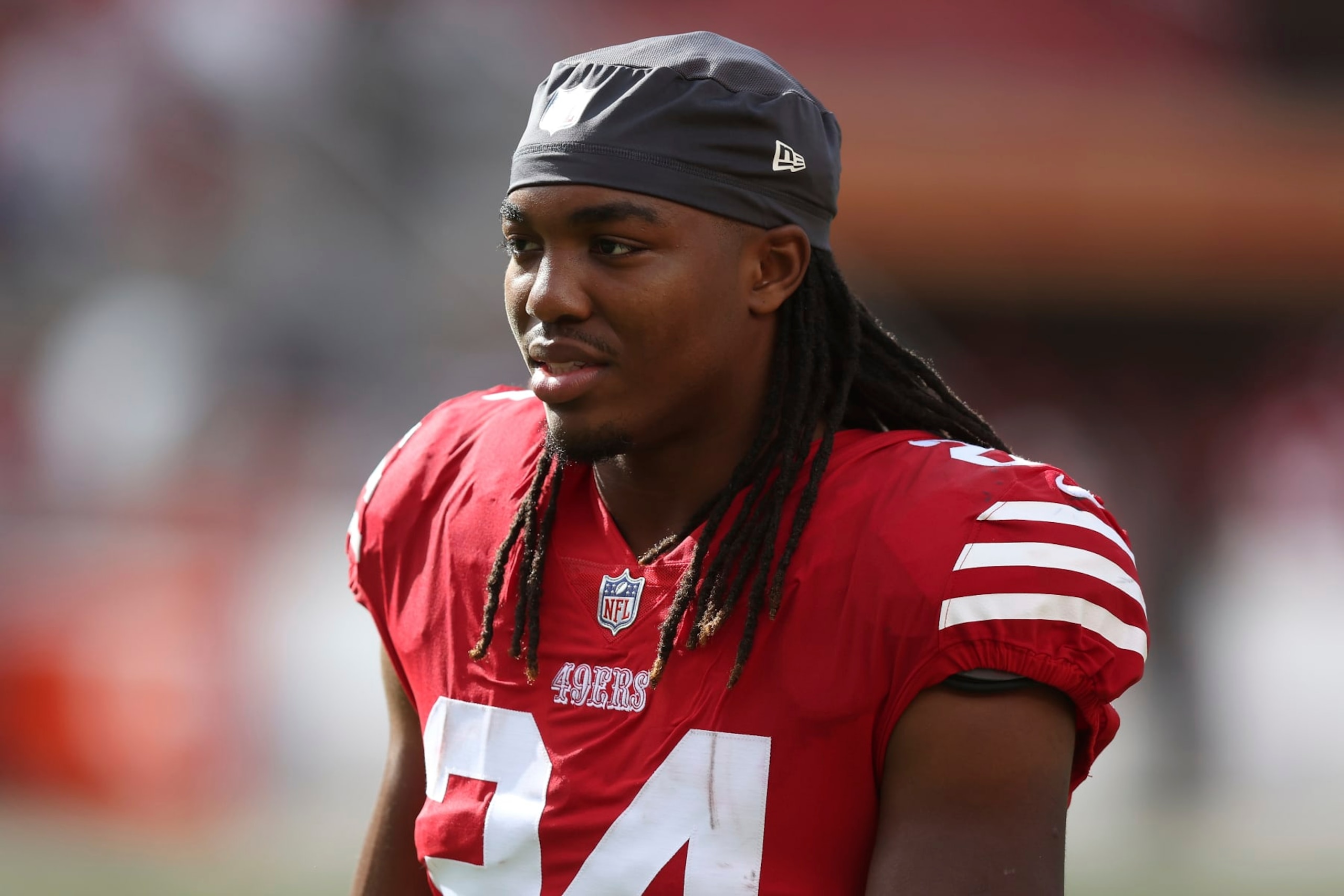 San Francisco 49ers running back Jordan Mason (24) looks on after a win during an NFL football game against the Seattle Seahawks, Sunday, Sept. 18, 2022 in Santa Clara, Calif. (AP Photo/Lachlan Cunningham)