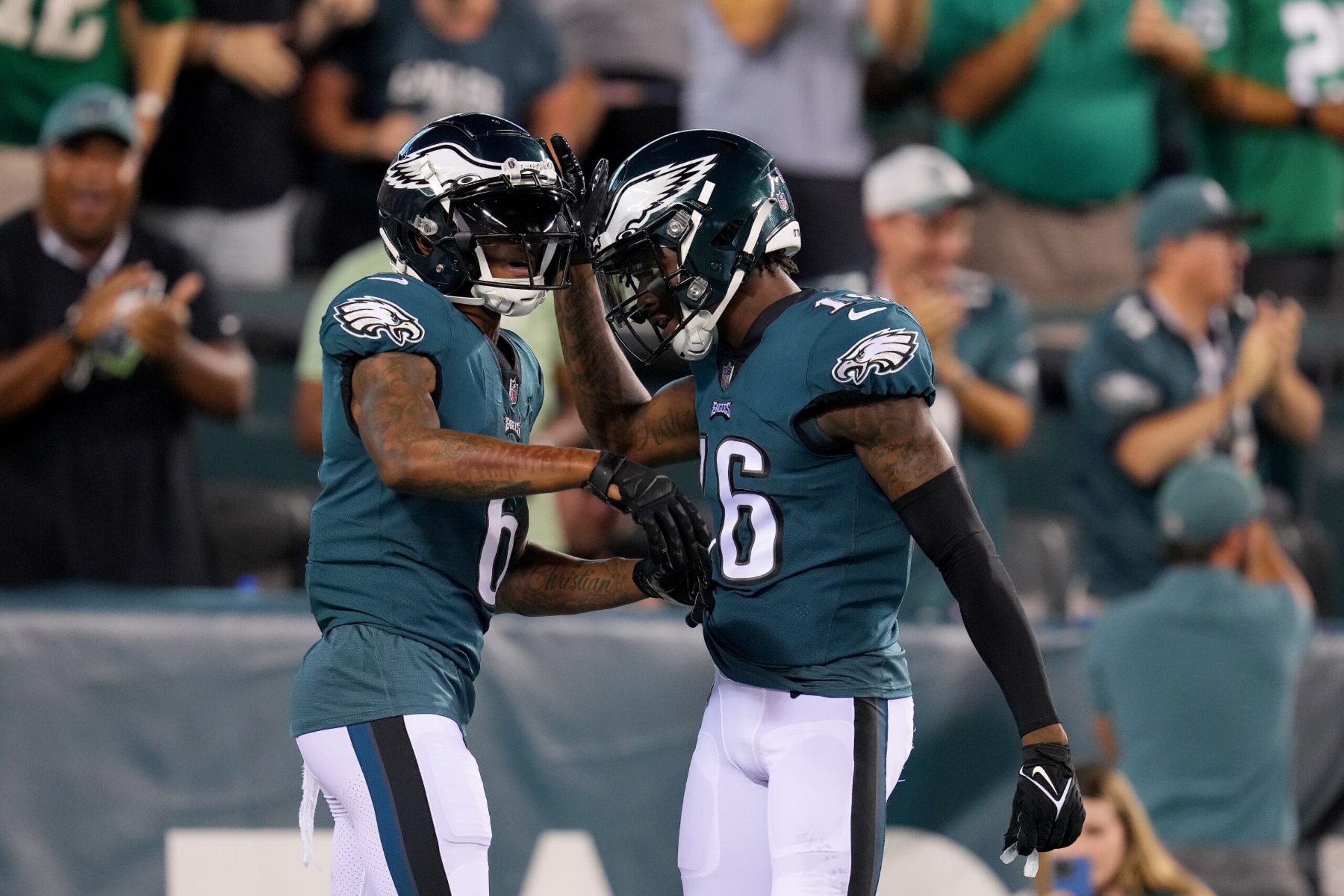 PHILADELPHIA, PENNSYLVANIA - SEPTEMBER 19: DeVonta Smith #6 and Quez Watkins #16 of the Philadelphia Eagles celebrate a touchdown  during the second quarter against the Minnesota Vikings at Lincoln Financial Field on September 19, 2022 in Philadelphia, Pennsylvania. (Photo by Mitchell Leff/Getty Images)
