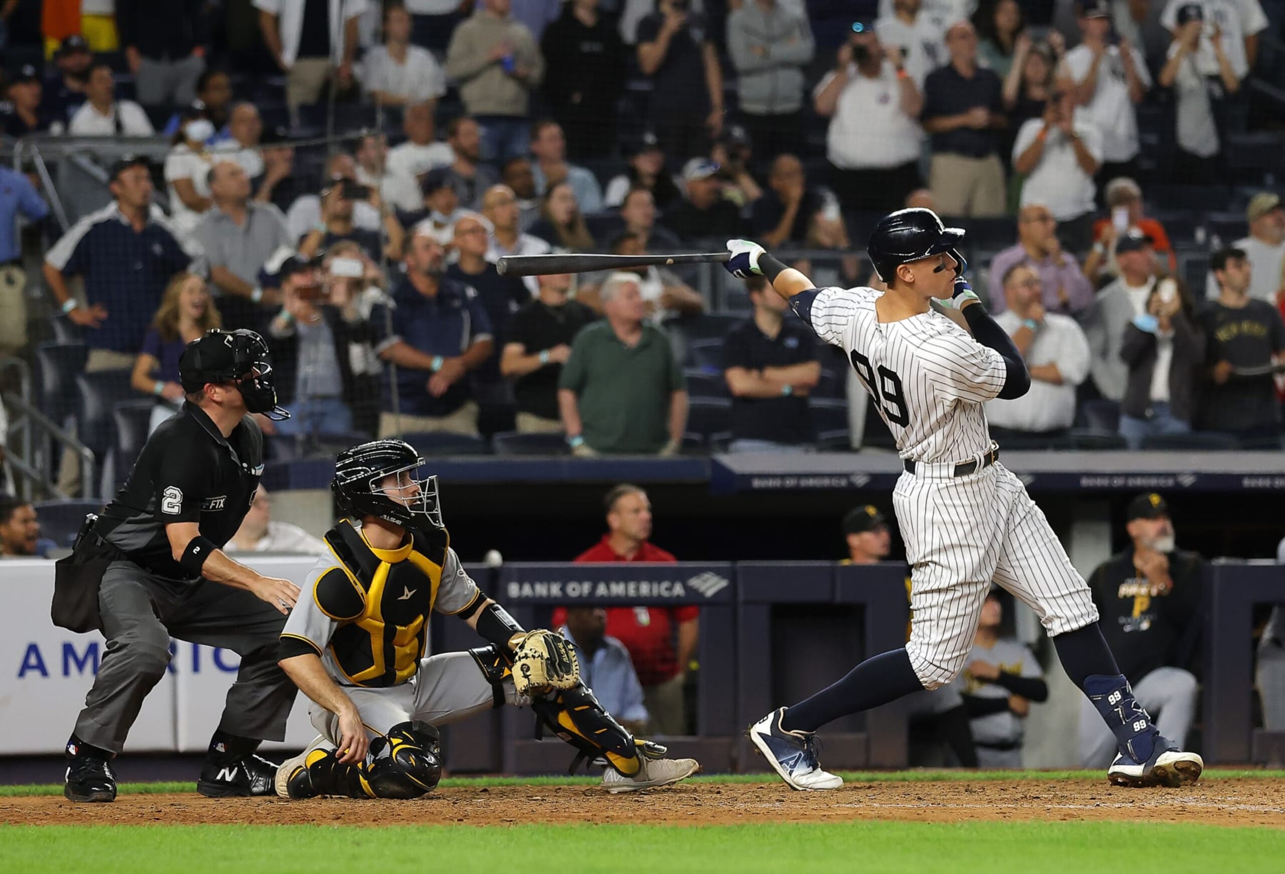 NEW YORK, NEW YORK - SEPTEMBER 20:  Aaron Judge #99 of the New York Yankees hits his 60th home run of the season during the 9th inning of the game against the Pittsburgh Pirates at Yankee Stadium on September 20, 2022 in the Bronx borough of New York City. (Photo by Jamie Squire/Getty Images)