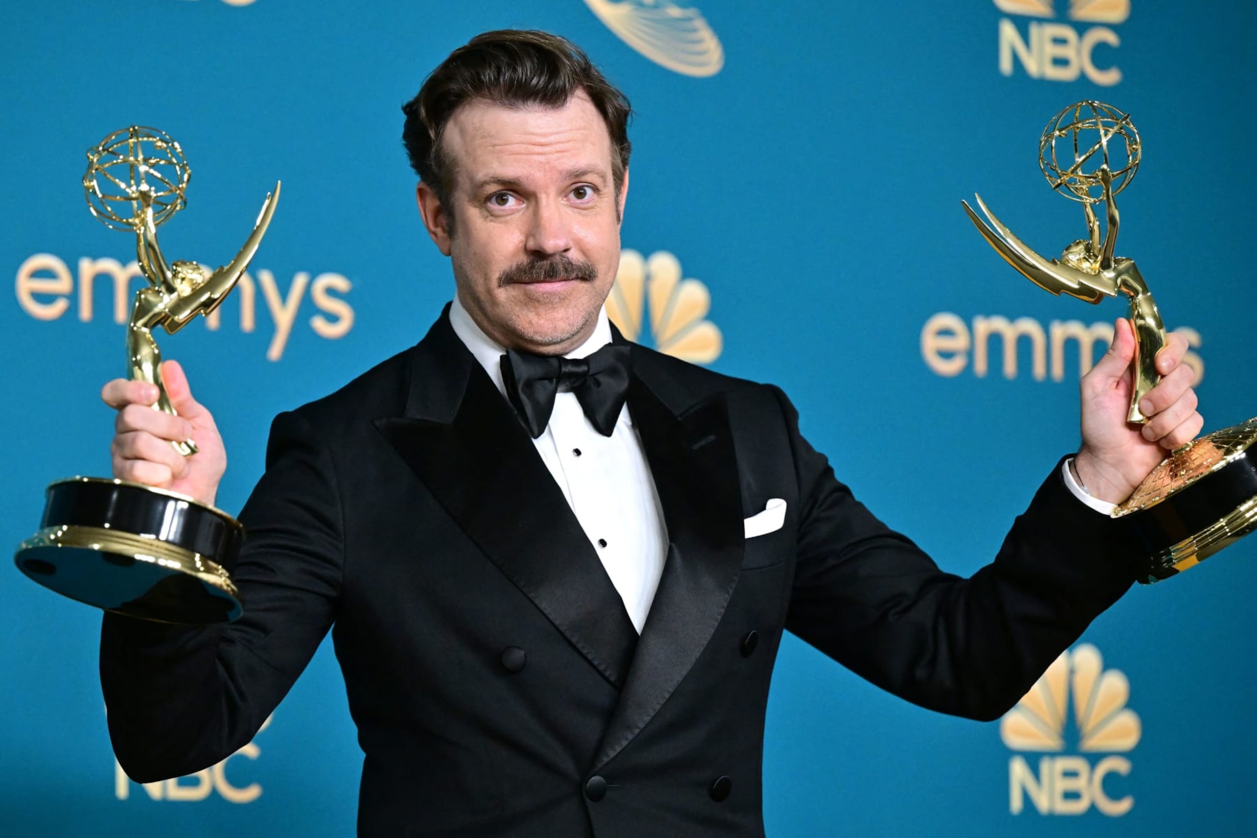 TOPSHOT - US actor Jason Sudeikis poses with the awards for Outstanding Comedy Series and Outstanding Lead Actor In A Comedy Series for "Ted Lasso" during the 74th Emmy Awards at the Microsoft Theater in Los Angeles, California, on September 12, 2022. (Photo by Frederic J. Brown / AFP) (Photo by FREDERIC J. BROWN/AFP via Getty Images)