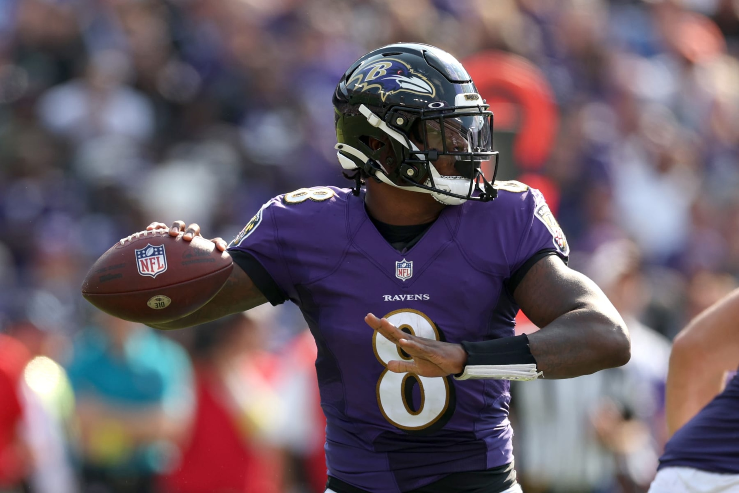 BALTIMORE, MARYLAND - SEPTEMBER 18: Quarterback Lamar Jackson #8 of the Baltimore Ravens throws a second half pass 	against the Miami Dolphins at M&T Bank Stadium on September 18, 2022 in Baltimore, Maryland. (Photo by Rob Carr/Getty Images)