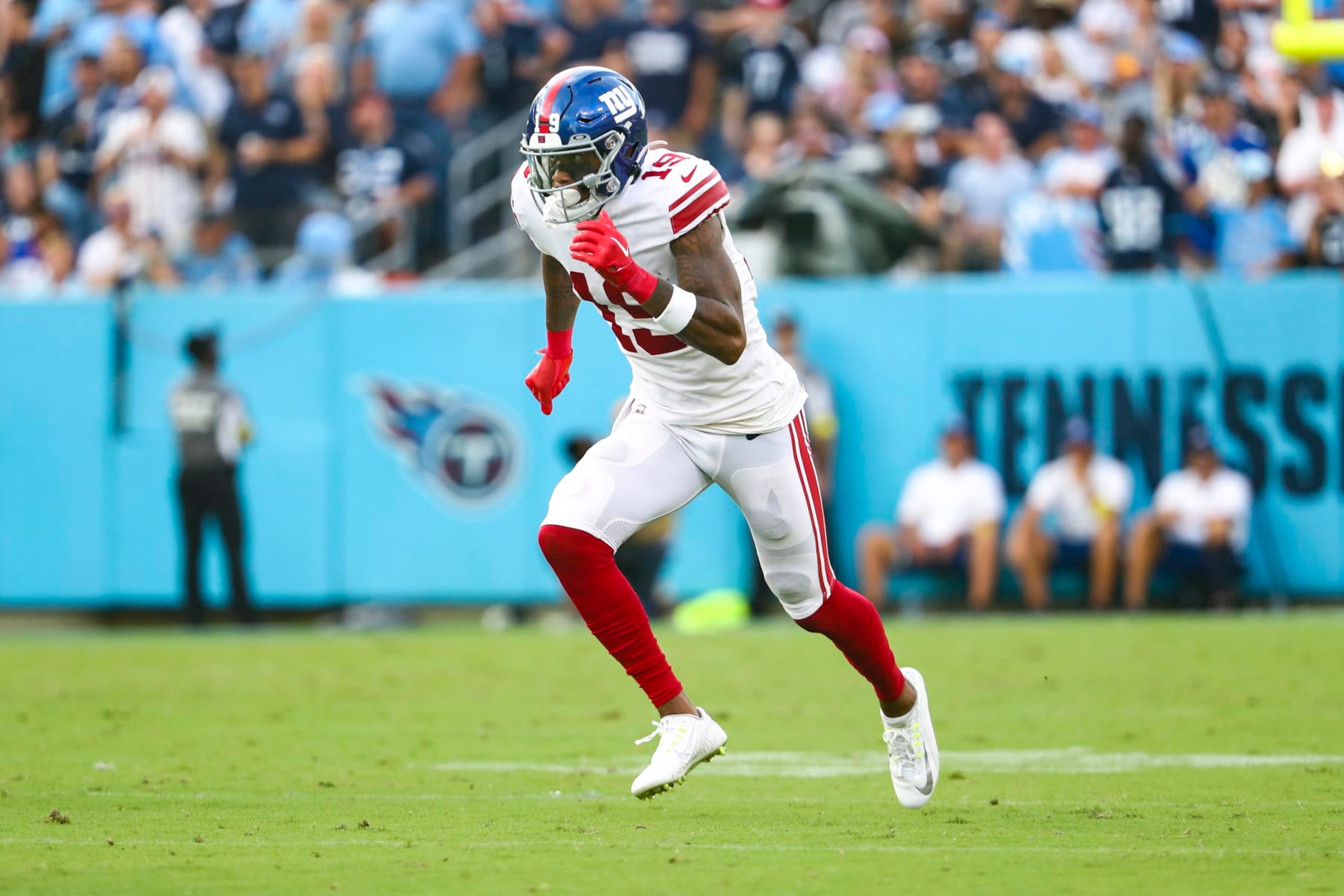 NASHVILLE, FL - SEPTEMBER 11: Kenny Golladay #19 of the New York Giants runs downfield during an NFL football game against the Tennessee Titans at Nissan Stadium on September 11, 2022 in Nashville, Tennessee. (Photo by Kevin Sabitus/Getty Images)