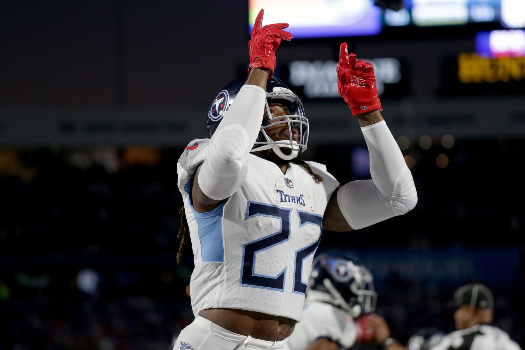 ORCHARD PARK, NEW YORK - SEPTEMBER 19: Derrick Henry #22 of the Tennessee Titans celebrates after scoring a touchdown against the Buffalo Bills during the first quarter of the game at Highmark Stadium on September 19, 2022 in Orchard Park, New York. (Photo by Joshua Bessex/Getty Images)