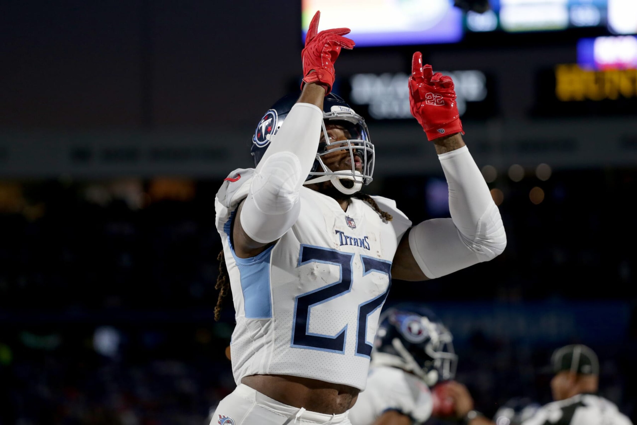 ORCHARD PARK, NEW YORK - SEPTEMBER 19: Derrick Henry #22 of the Tennessee Titans celebrates after scoring a touchdown against the Buffalo Bills during the first quarter of the game at Highmark Stadium on September 19, 2022 in Orchard Park, New York. (Photo by Joshua Bessex/Getty Images)