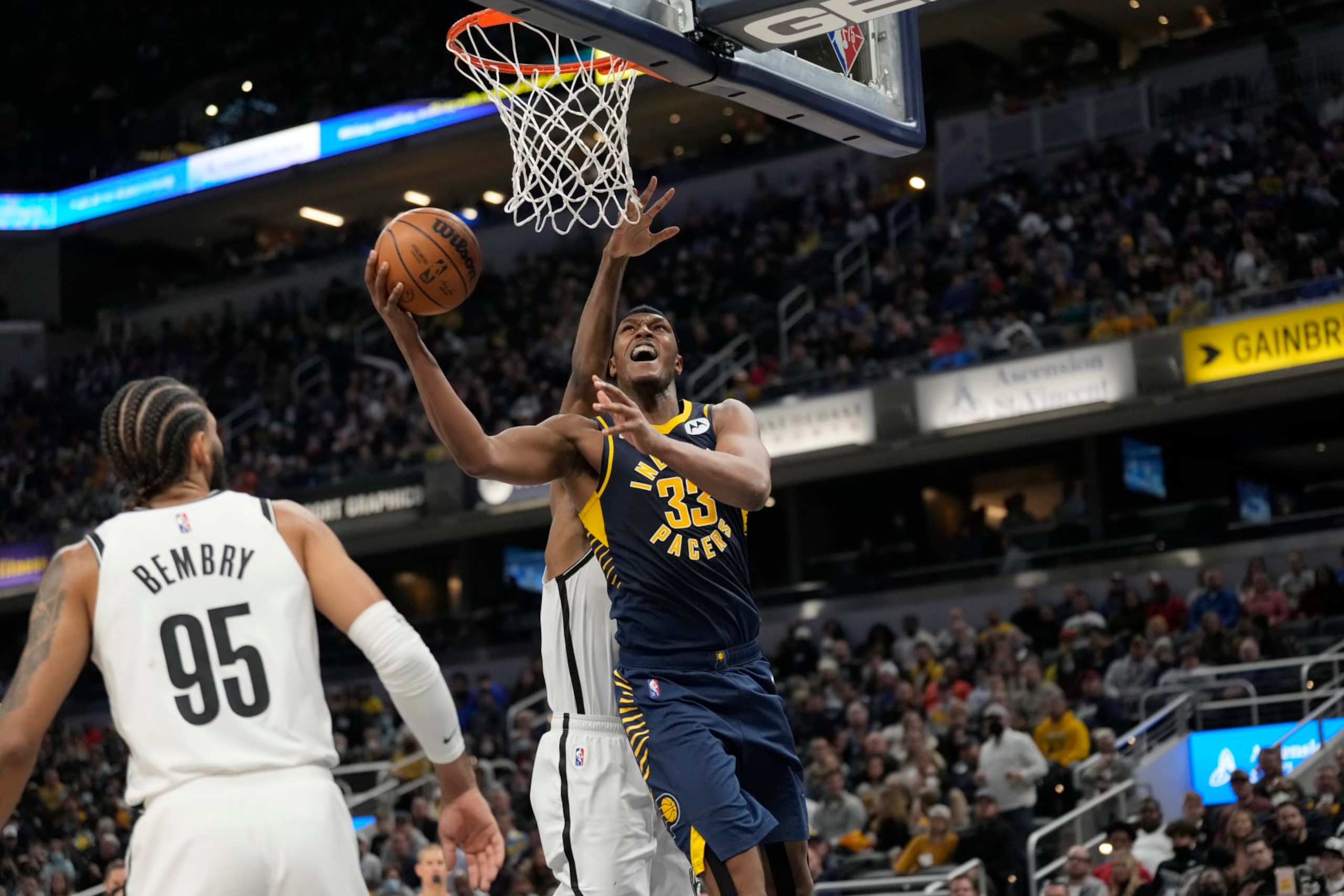 INDIANAPOLIS, IN - JANUARY 5: Myles Turner #33 of the Indiana Pacers drives to the basket during the game against the Brooklyn Nets on January 5, 2022 at Gainbridge Fieldhouse in Indianapolis, Indiana. NOTE TO USER: User expressly acknowledges and agrees that, by downloading and or using this Photograph, user is consenting to the terms and conditions of the Getty Images License Agreement. Mandatory Copyright Notice: Copyright 2022 NBAE (Photo by A.J. Mast/NBAE via Getty Images)