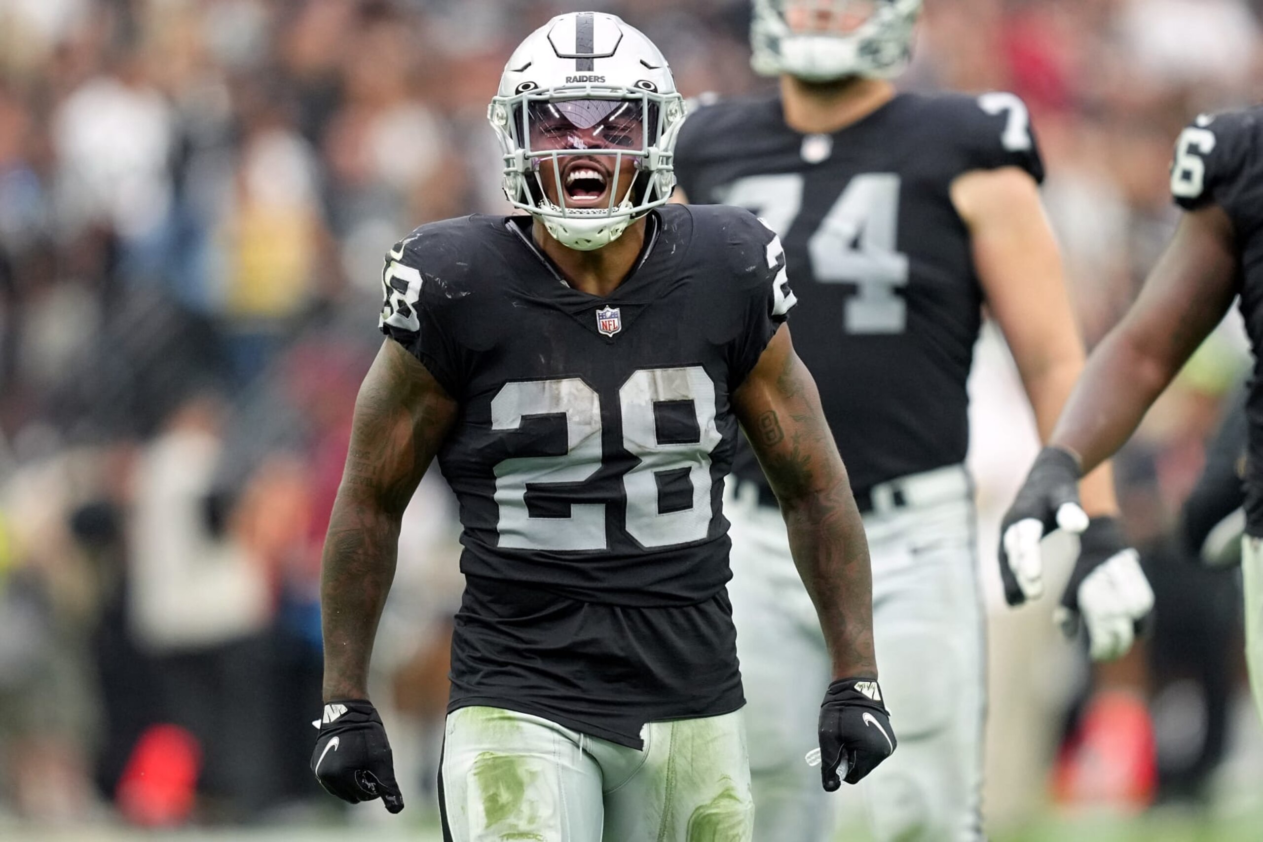 LAS VEGAS, NEVADA - SEPTEMBER 18: Josh Jacobs #28 of the Las Vegas Raiders reacts in the second quarter against the Arizona Cardinals at Allegiant Stadium on September 18, 2022 in Las Vegas, Nevada. (Photo by Jeff Bottari/Getty Images)