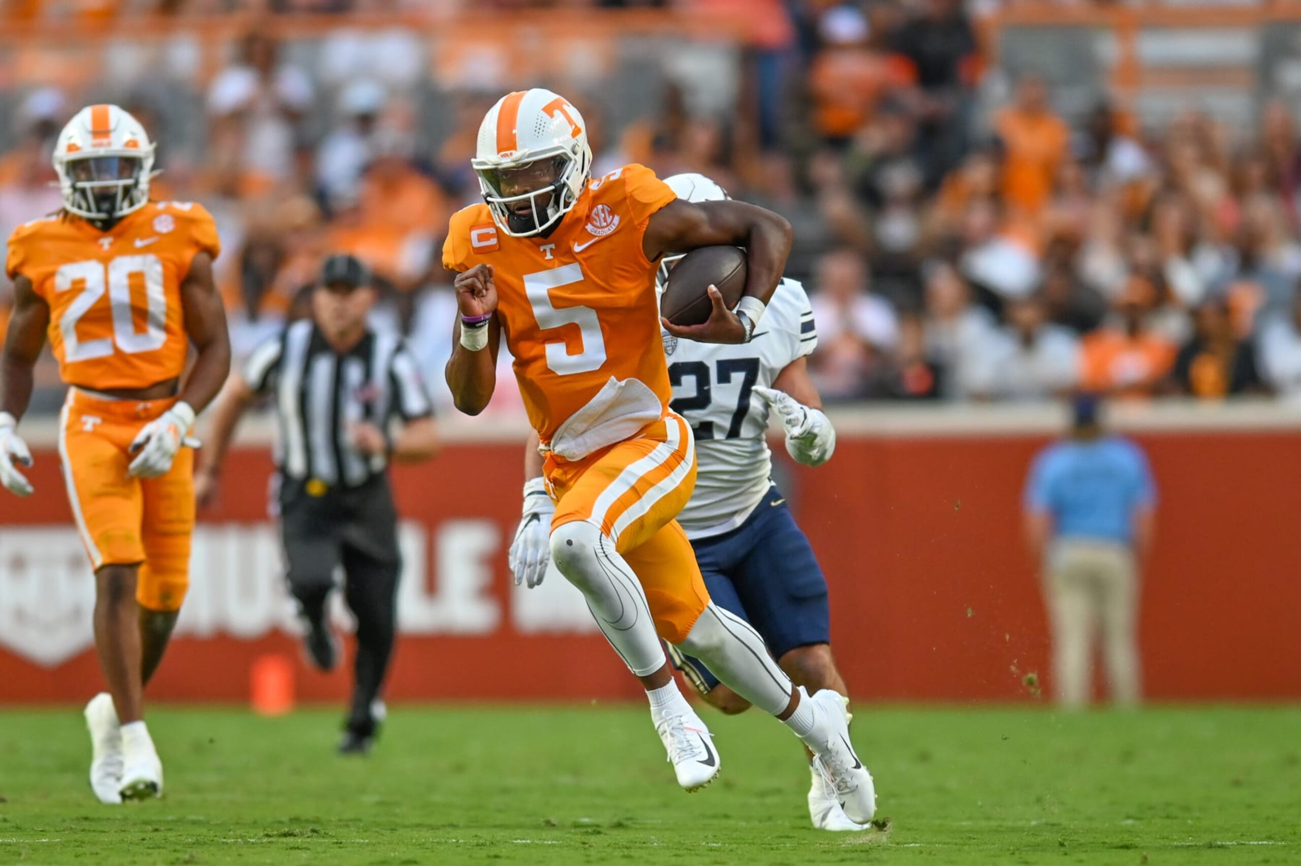 KNOXVILLE, TN - SEPTEMBER 17: Tennessee quarterback Hendon Hooker (5) runs the ball during the college football game between the Akron Zips and the Tennessee Volunteers at Neyland Stadium in Knoxville, TN. (Photo by Kevin Langley/Icon Sportswire via Getty Images) KNOXVILLE, TN - SEPTEMBER 17: Tennessee quarterback Hendon Hooker (5) runs the ball during the college football game between the Akron Zips and the Tennessee Volunteers at Neyland Stadium in Knoxville, TN. (Photo by Kevin Langley/Icon Sportswire via Getty Images)