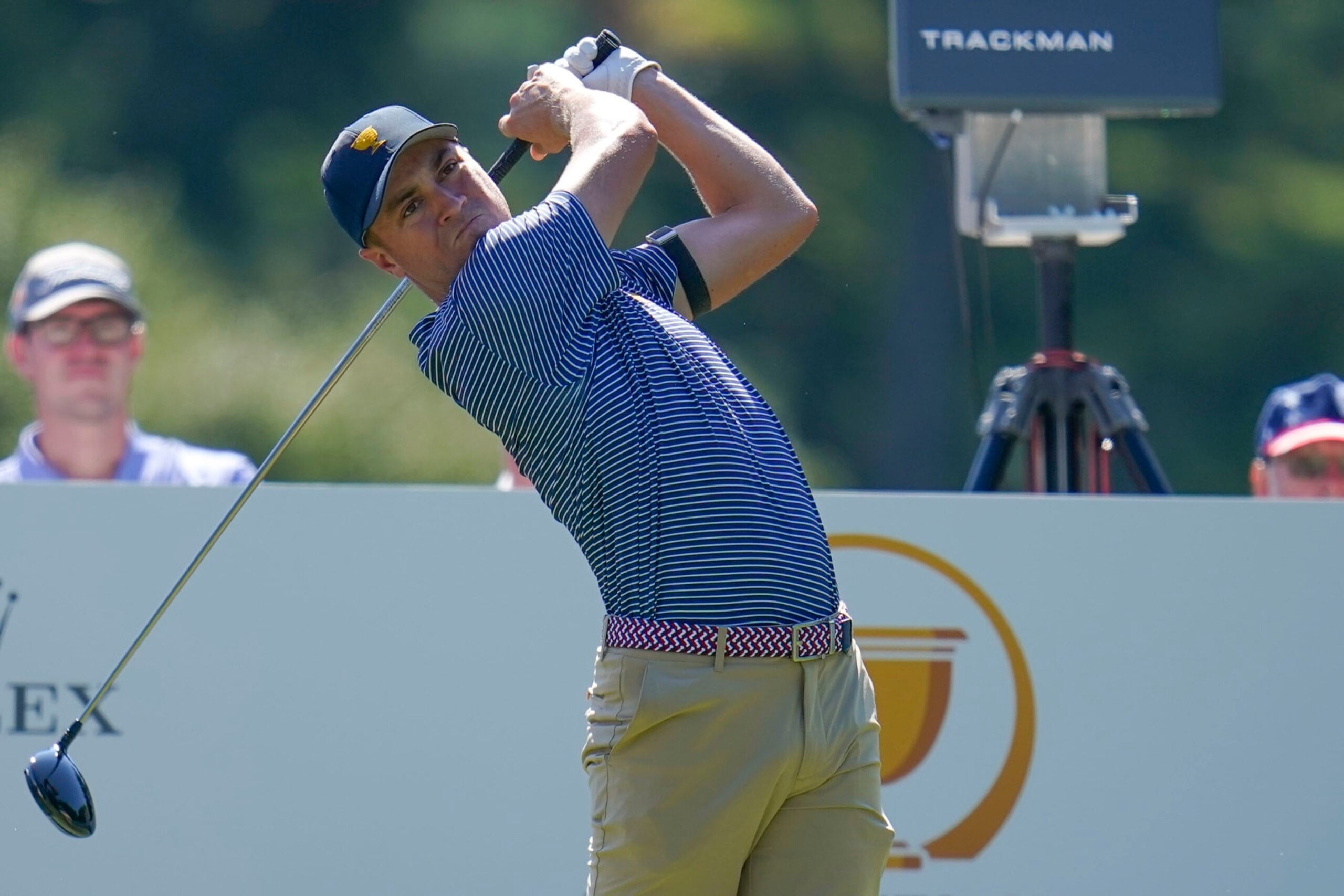 Justin Thomas hits from the third tee during practice for the Presidents Cup golf tournament at the Quail Hollow Club, Wednesday, Sept. 21, 2022, in Charlotte, N.C. (AP Photo/Julio Cortez)