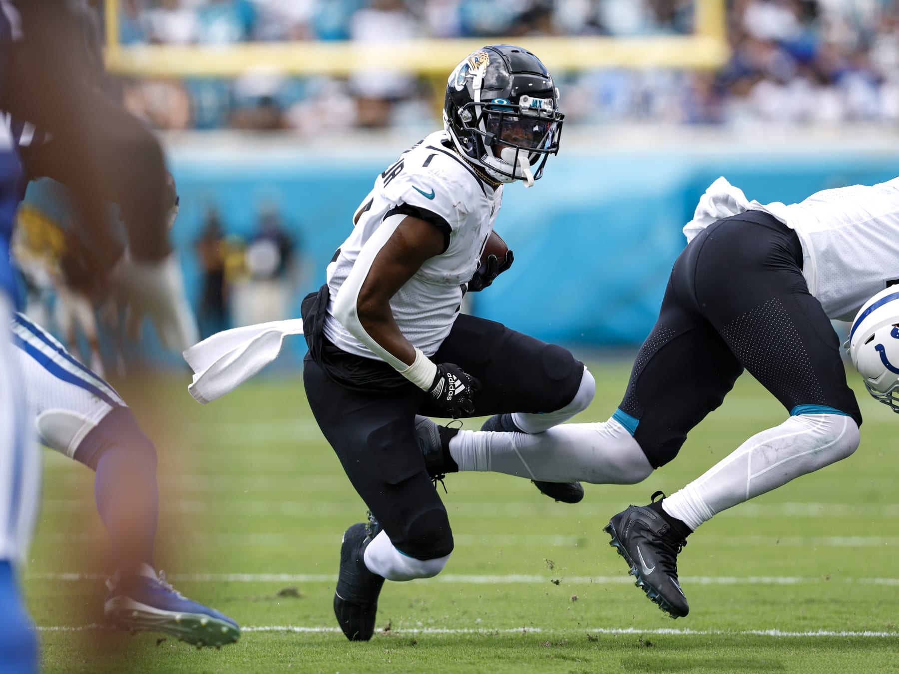 JACKSONVILLE, FL - SEPTEMBER 18: Runningback Travis Etienne Jr. #1 of the Jacksonville Jaguars on a running play during the game against the Indianapolis Colts at TIAA Bank Field on September 18, 2022 in Jacksonville, Florida. The Jaguars defeated the Colts 24-0. (Photo by Don Juan Moore/Getty Images)
