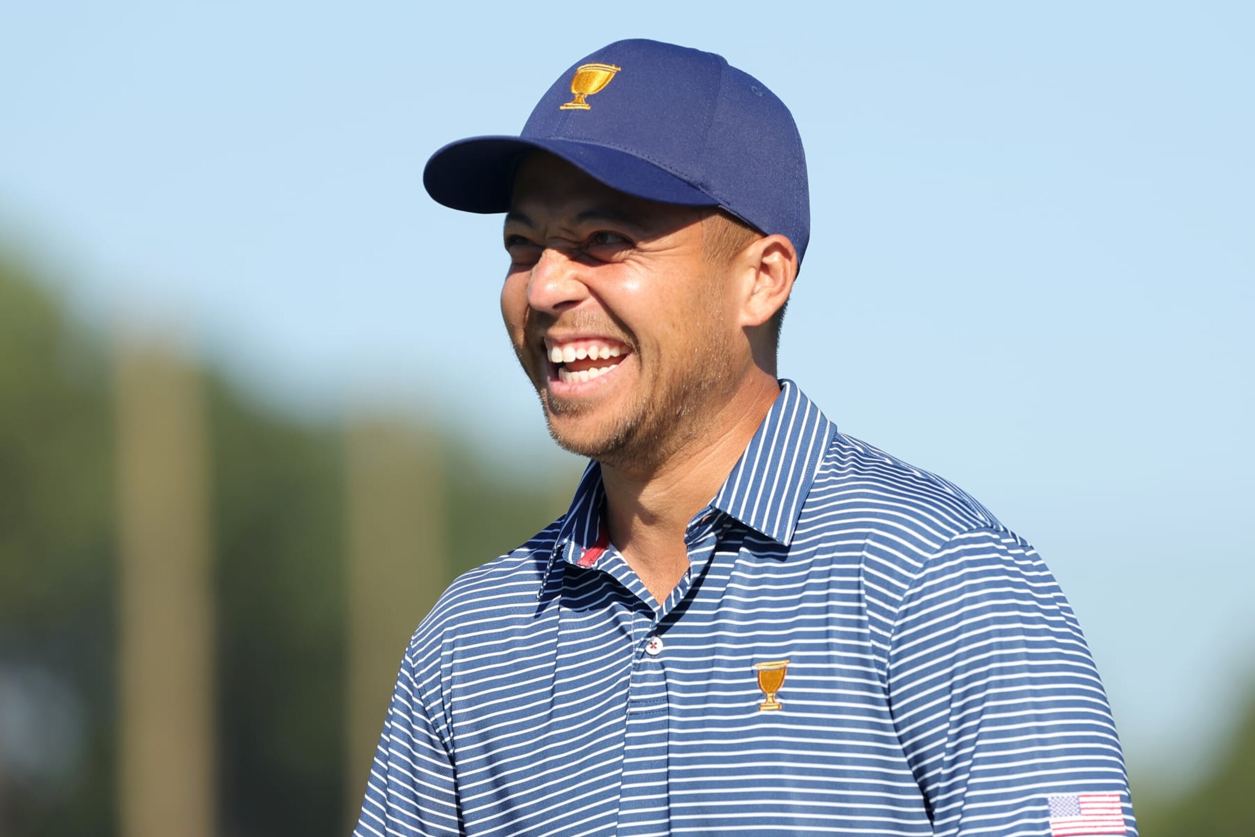 CHARLOTTE, NORTH CAROLINA - SEPTEMBER 21: Xander Schauffele of the United States Team smiles prior to the 2022 Presidents Cup at Quail Hollow Country Club on September 21, 2022 in Charlotte, North Carolina. (Photo by Stacy Revere/Getty Images) CHARLOTTE, NORTH CAROLINA - SEPTEMBER 21: Xander Schauffele of the United States Team smiles prior to the 2022 Presidents Cup at Quail Hollow Country Club on September 21, 2022 in Charlotte, North Carolina. (Photo by Stacy Revere/Getty Images)