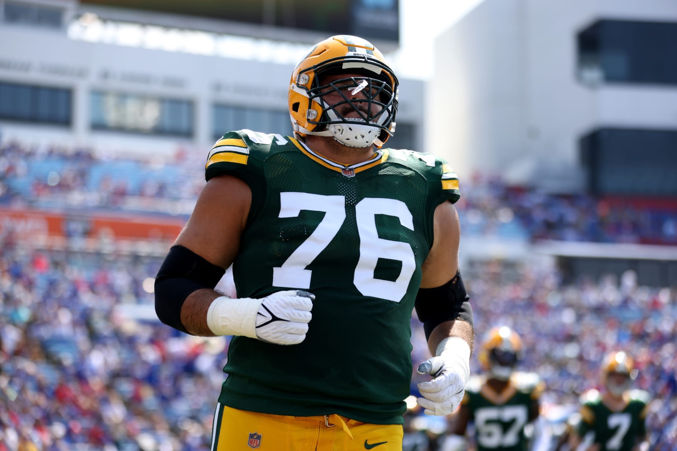 ORCHARD PARK, NEW YORK - AUGUST 28: Jon Runyan #76 of the Green Bay Packers runs on the field prior to a game against the Buffalo Bills at Highmark Stadium on August 28, 2021 in Orchard Park, New York. (Photo by Bryan Bennett/Getty Images)