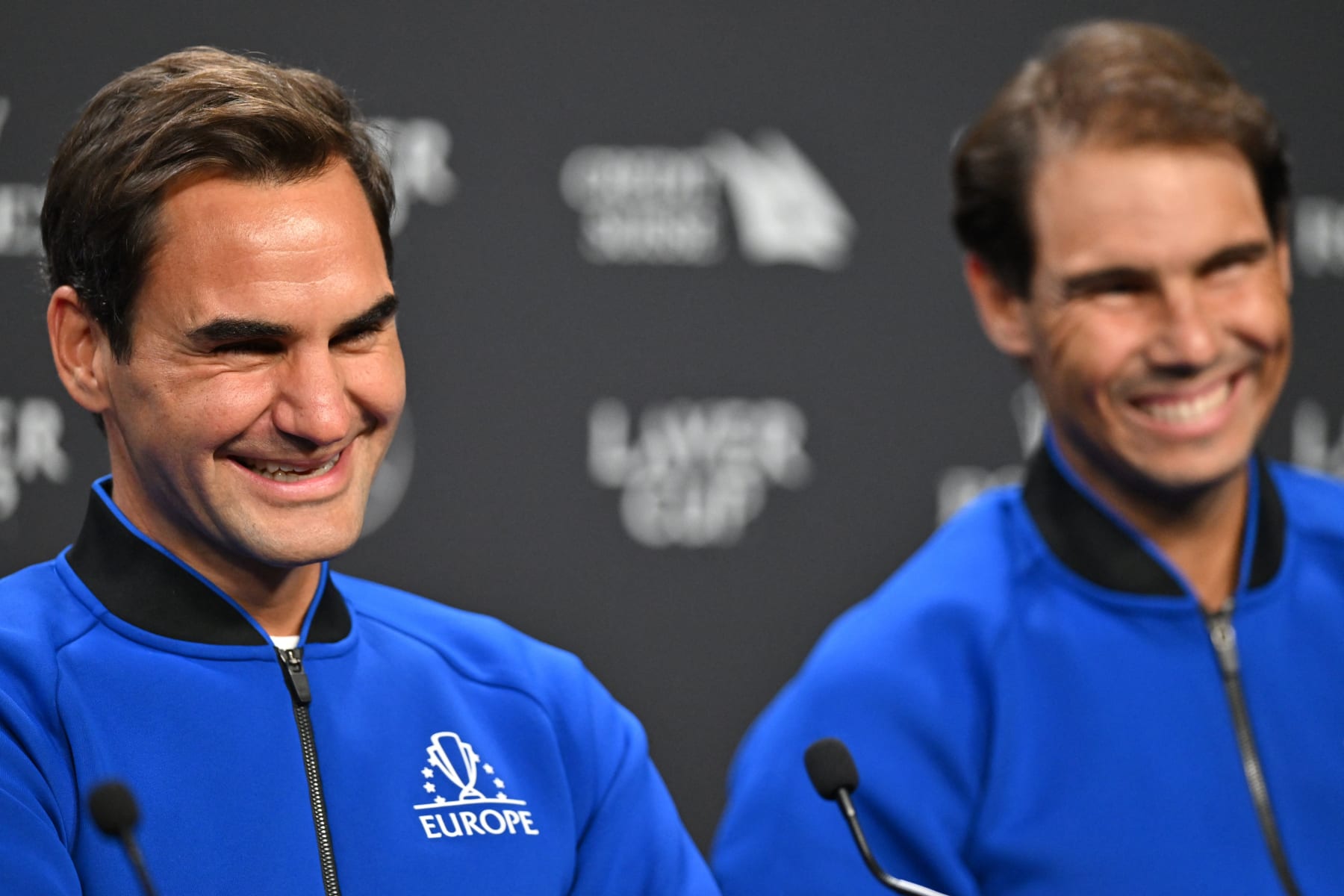Switzerland's Roger Federer (L) and Spain's Rafael Nadal share a laugh during a press conference for Team Europe ahead of the 2022 Laver Cup at the O2 Arena in London on September 22, 2022. - RESTRICTED TO EDITORIAL USE (Photo by Glyn KIRK / AFP) / RESTRICTED TO EDITORIAL USE (Photo by GLYN KIRK/AFP via Getty Images)