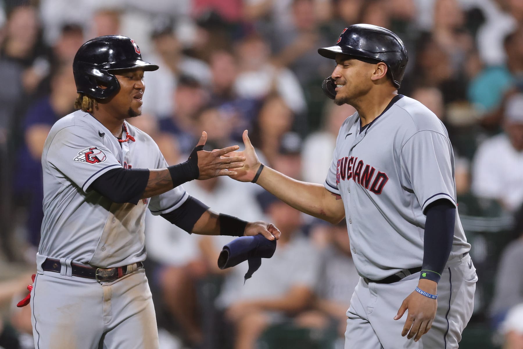CHICAGO, ILLINOIS - SEPTEMBER 21: Josh Naylor #22 of the Cleveland Guardians celebrates his two-run home run with Jose Ramirez #11 against the Chicago White Sox during the seventh inning at Guaranteed Rate Field on September 21, 2022 in Chicago, Illinois. (Photo by Michael Reaves/Getty Images)