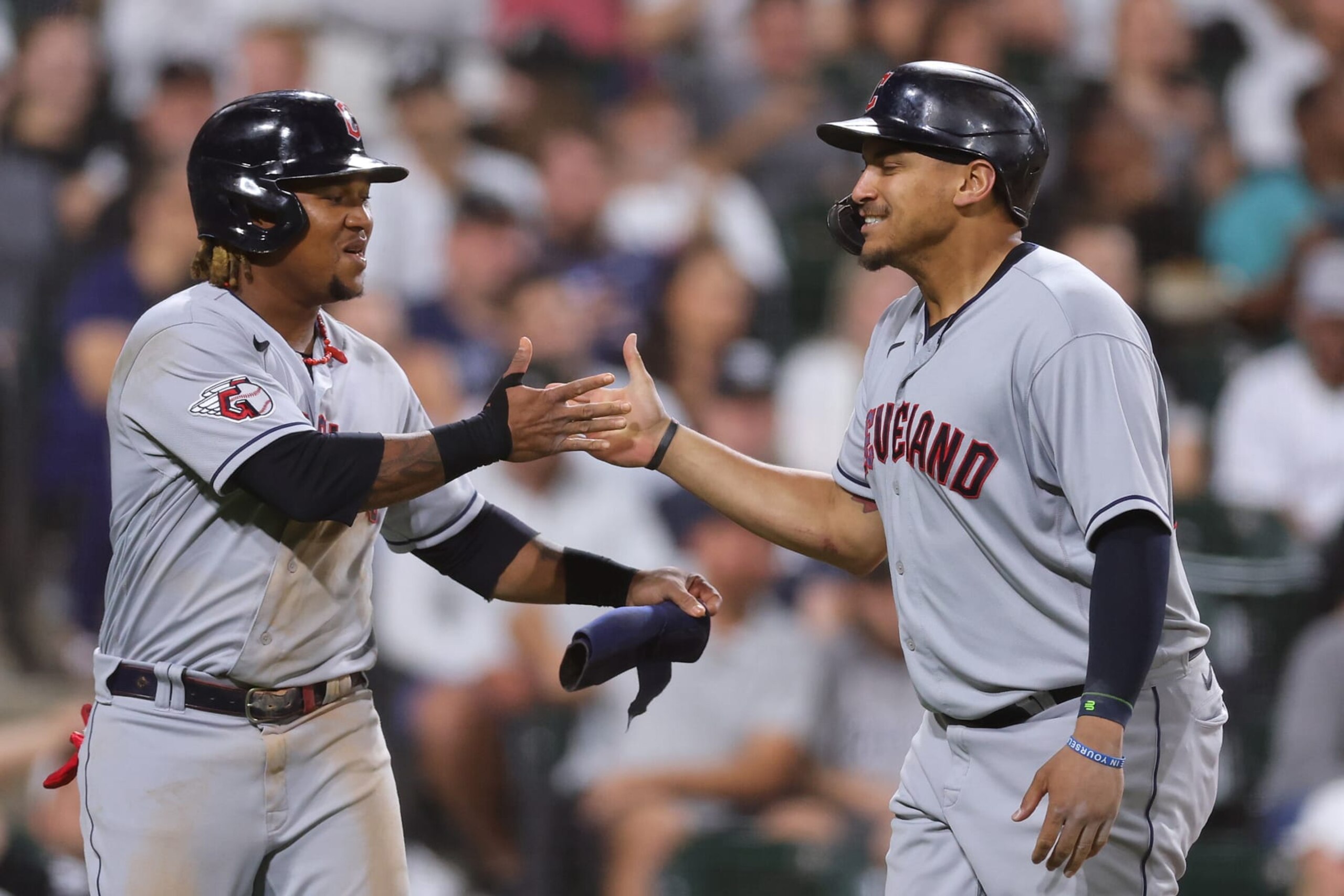 CHICAGO, ILLINOIS - SEPTEMBER 21: Josh Naylor #22 of the Cleveland Guardians celebrates his two-run home run with Jose Ramirez #11 against the Chicago White Sox during the seventh inning at Guaranteed Rate Field on September 21, 2022 in Chicago, Illinois. (Photo by Michael Reaves/Getty Images)