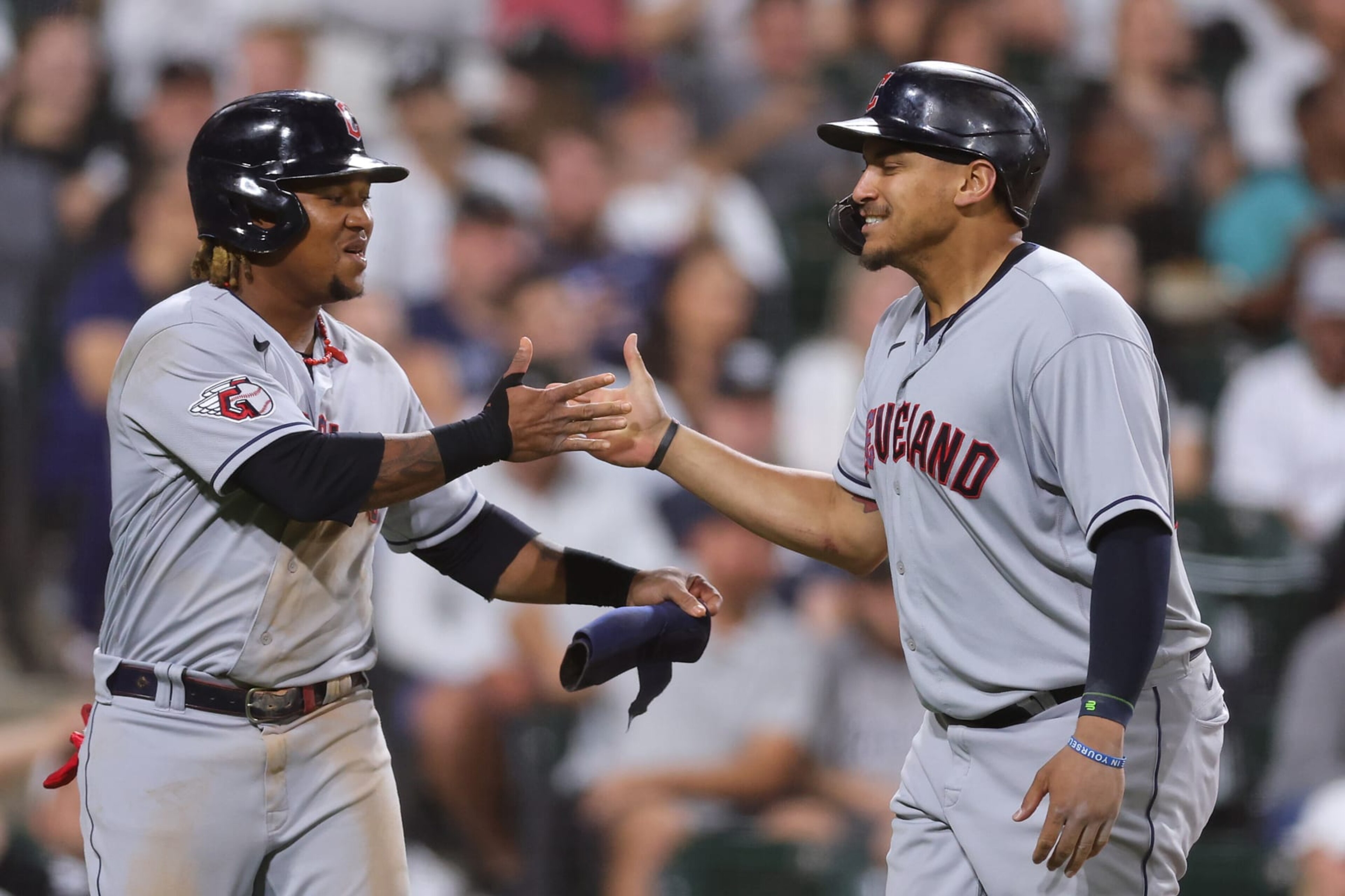 CHICAGO, ILLINOIS - SEPTEMBER 21: Josh Naylor #22 of the Cleveland Guardians celebrates his two-run home run with Jose Ramirez #11 against the Chicago White Sox during the seventh inning at Guaranteed Rate Field on September 21, 2022 in Chicago, Illinois. (Photo by Michael Reaves/Getty Images)