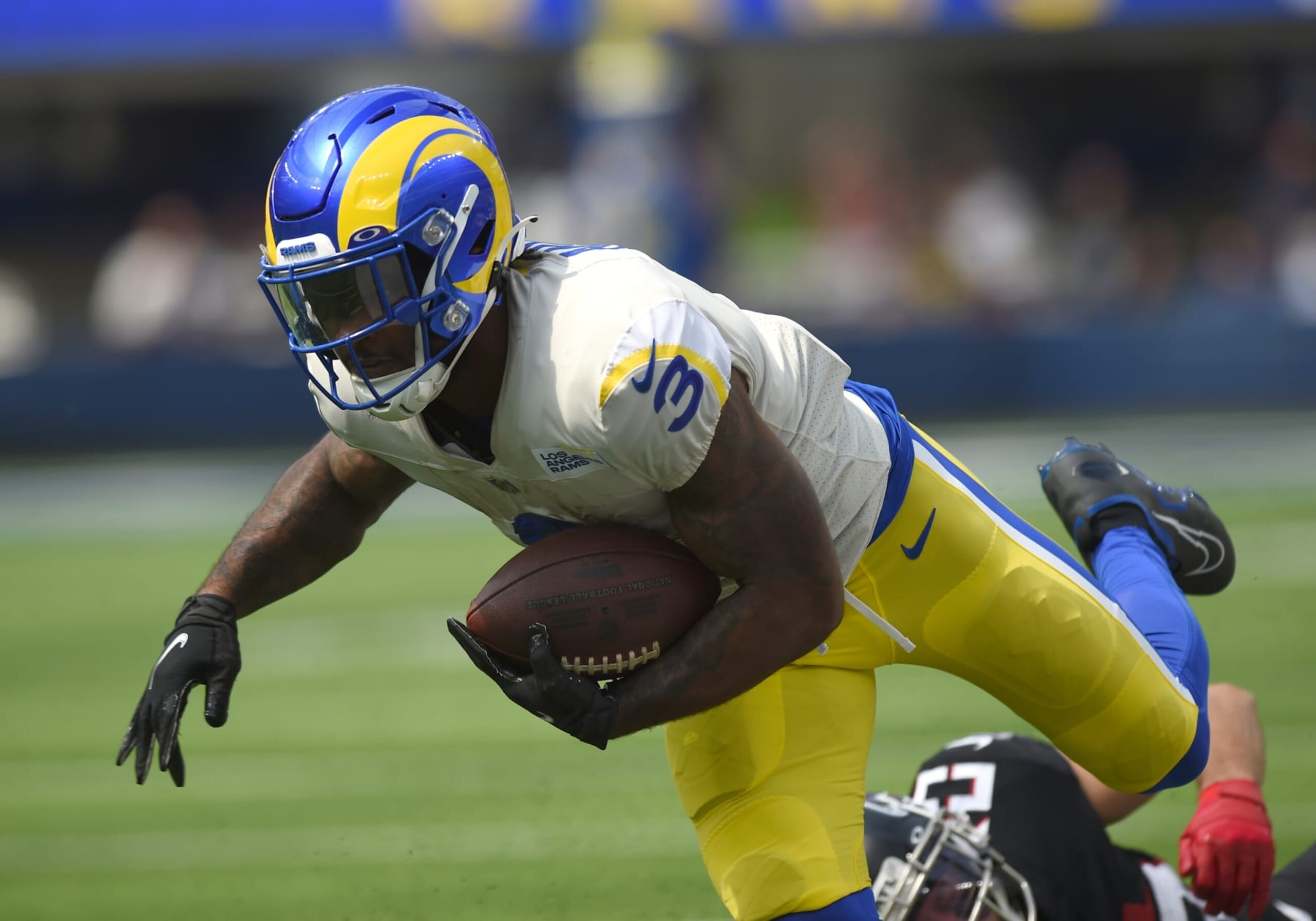 INGLEWOOD, CA - SEPTEMBER 18: Los Angeles Rams Running Back Cam Akers (3) leaps for extra yardage at the end of a run during an NFL game between the Atlanta Falcons and the Los Angeles Rams on September 18, 2022, at SoFi Stadium in Inglewood, CA. (Photo by Chris Williams/Icon Sportswire via Getty Images)
