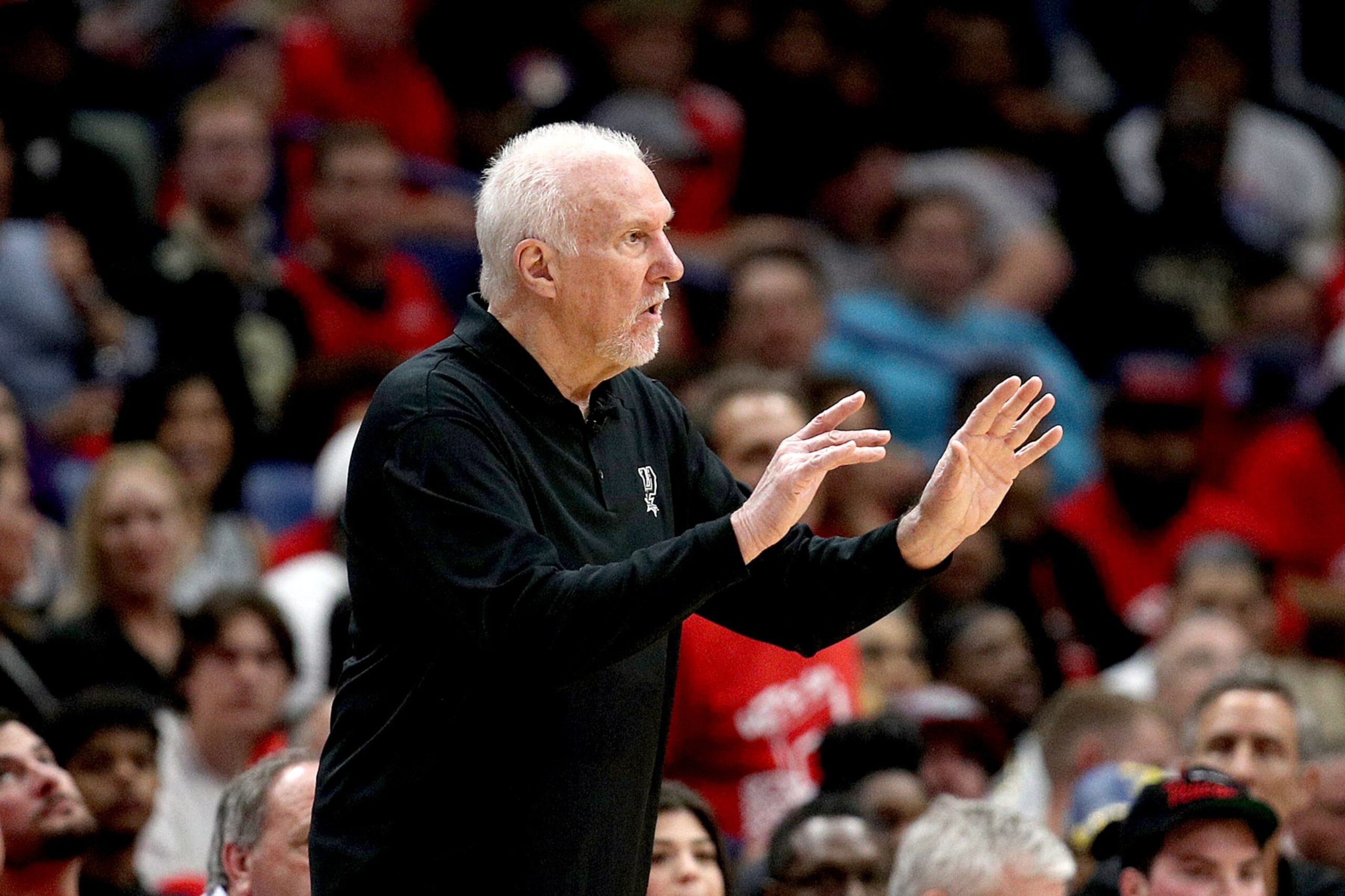NEW ORLEANS, LOUISIANA - APRIL 13: Gregg Popovich head coach of the San Antonio Spurs looks on during the first quarter of the 2022 NBA Play-In Tournament against the New Orleans Pelicans at Smoothie King Center on April 13, 2022 in New Orleans, Louisiana. NOTE TO USER: User expressly acknowledges and agrees that, by downloading and or using this photograph, User is consenting to the terms and conditions of the Getty Images License Agreement. (Photo by Sean Gardner/Getty Images)