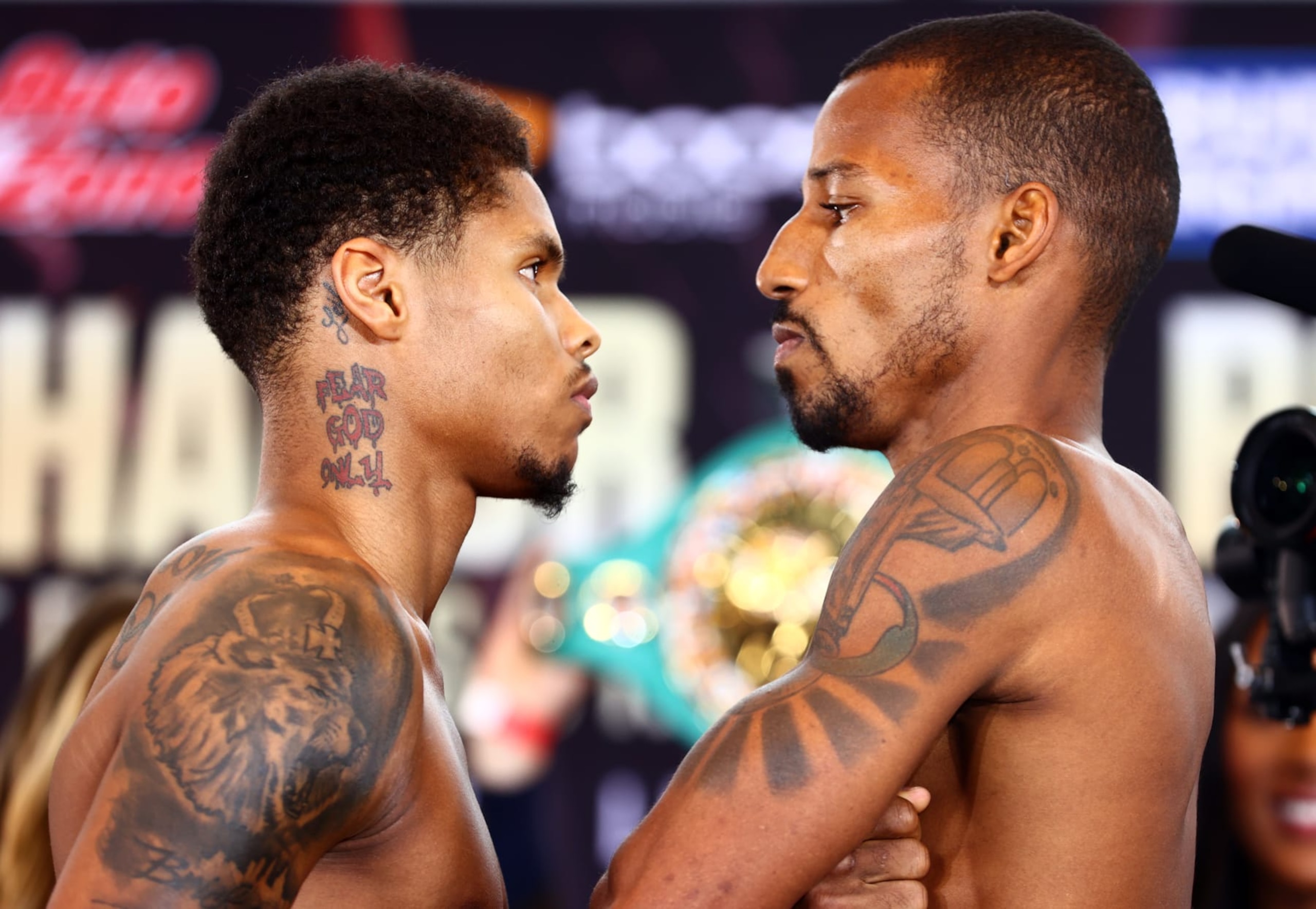 NEWARK, NEW JERSEY - SEPTEMBER 22: Shakur Stevenson (L) and Robson Conceição (R) face-off during the weigh in ahead of their WBC and WBO junior lightweight championship fight at Prudential Center on September 22, 2022 in Newark, New Jersey. (Photo by Mikey Williams/Top Rank Inc via Getty Images)